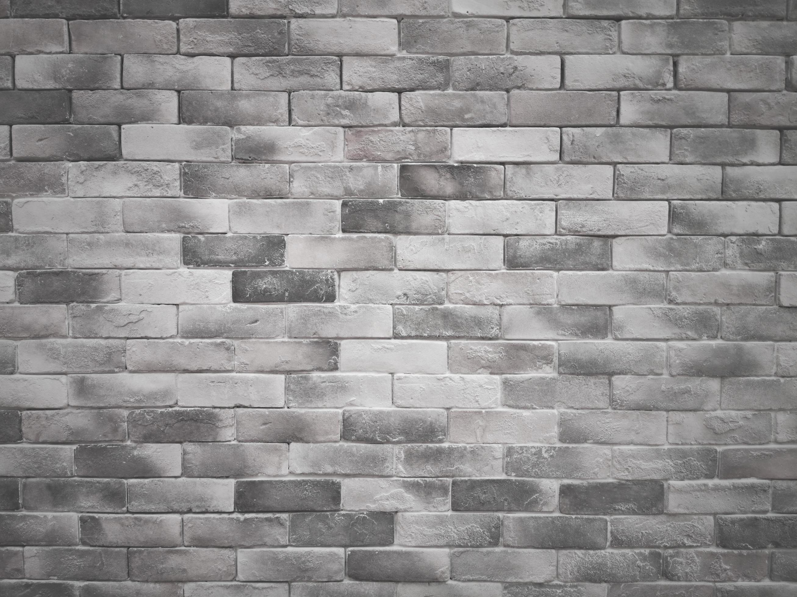 white and gray brick wall background 10335113 Stock Photo at Vecteezy