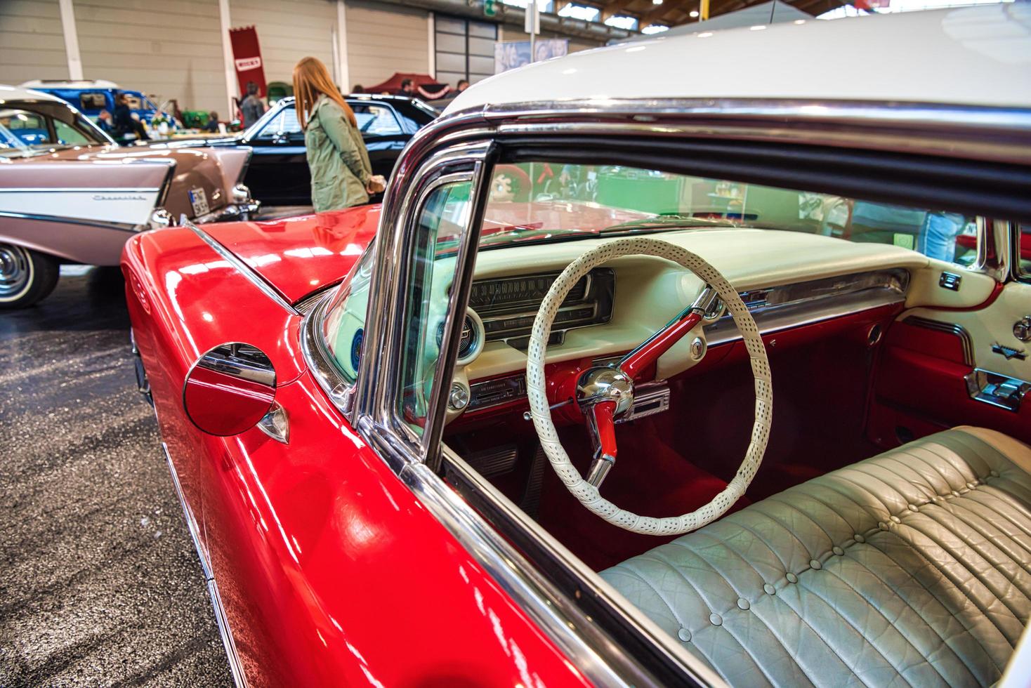 FRIEDRICHSHAFEN - MAY 2019 white leather interior of CADILLAC DE VILLE 1959 coupe at Motorworld Classics Bodensee on May 11, 2019 in Friedrichshafen, Germany photo