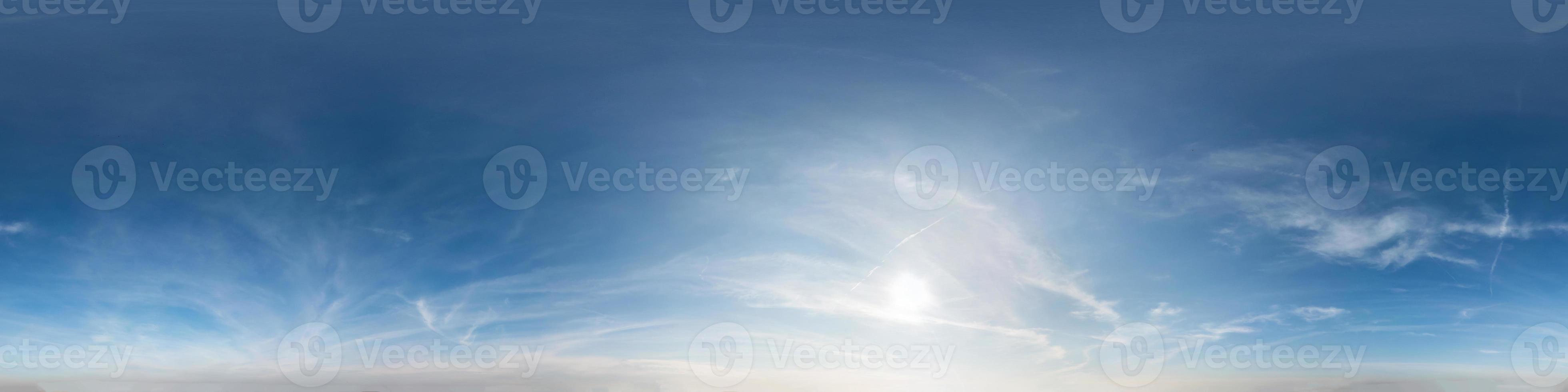 blue sky with clouds with evening sun. Seamless hdri panorama 360 degrees angle view with zenith for use in 3d graphics or game development as sky dome or edit drone shot photo