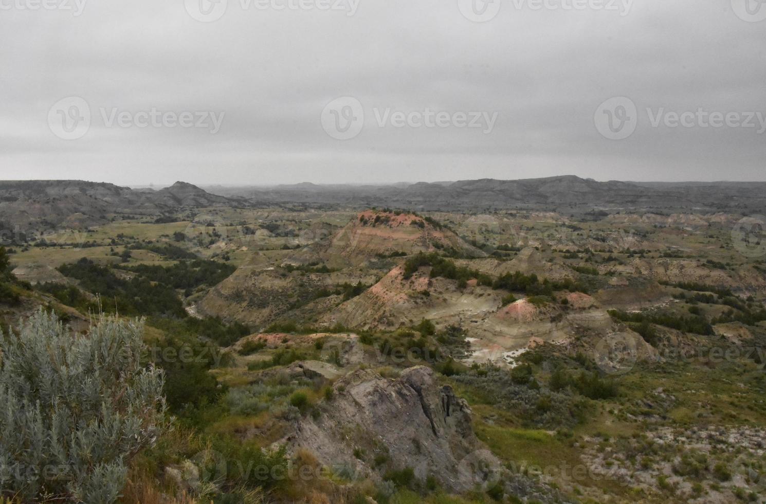 Thick Dark Cloudy Sky Over a Canyon in the Badlands photo