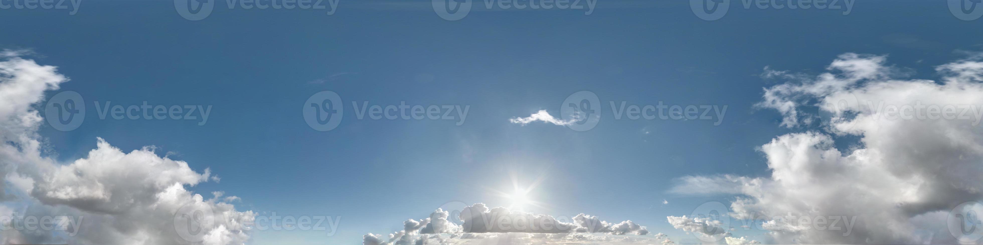 blue sky with beautiful cumulus clouds. Seamless hdri panorama 360 degrees angle view with zenith for use in 3d graphics or game development as sky dome or edit drone shot photo