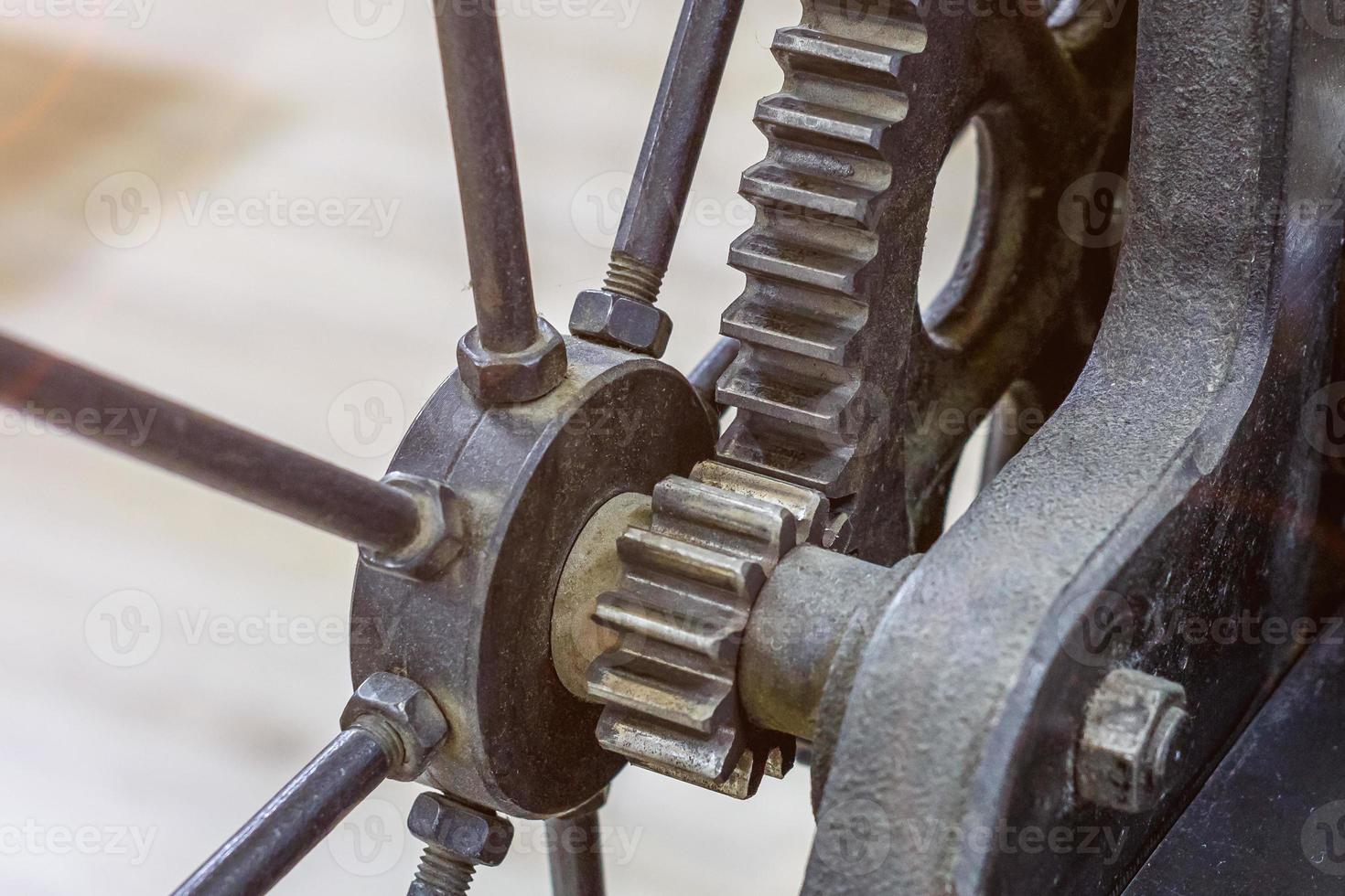 gears mechanism. details of old ancient machine for making engravings photo