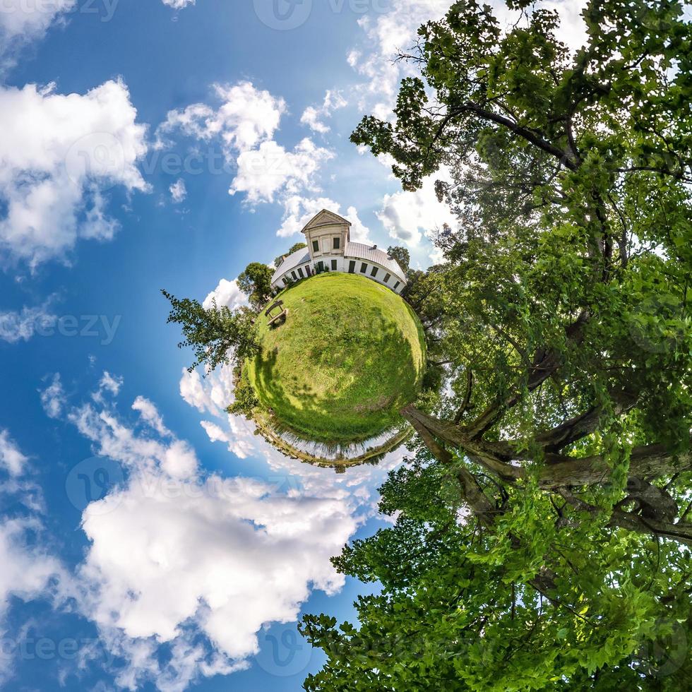 Little planet transformation of spherical panorama 360 degrees. Spherical abstract aerial view in field with awesome beautiful clouds. Curvature of space. photo