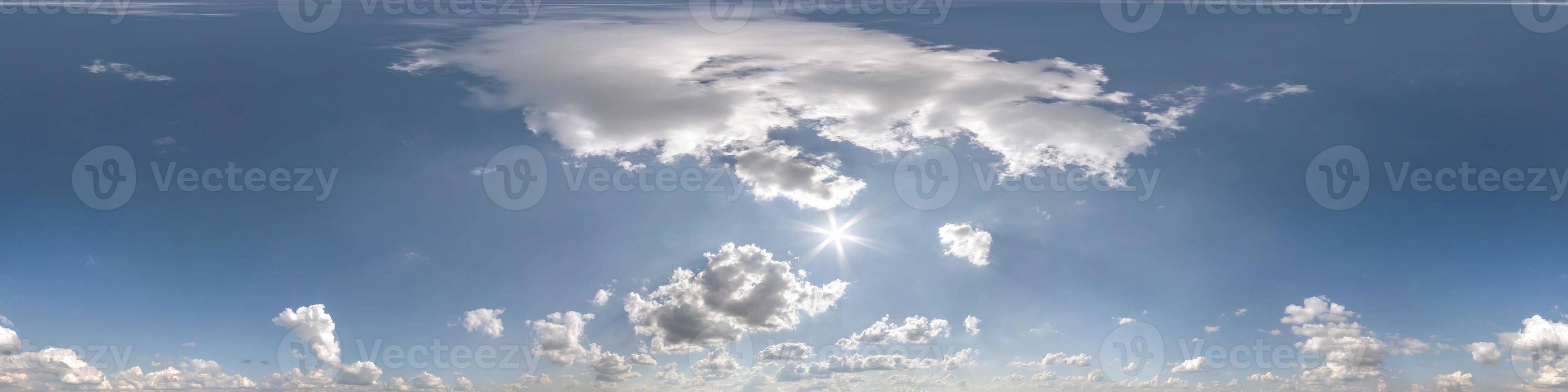 Seamless clear blue sky hdri panorama 360 degrees angle view with zenith and beautiful clouds for use in 3d graphics as sky dome or edit drone shot photo