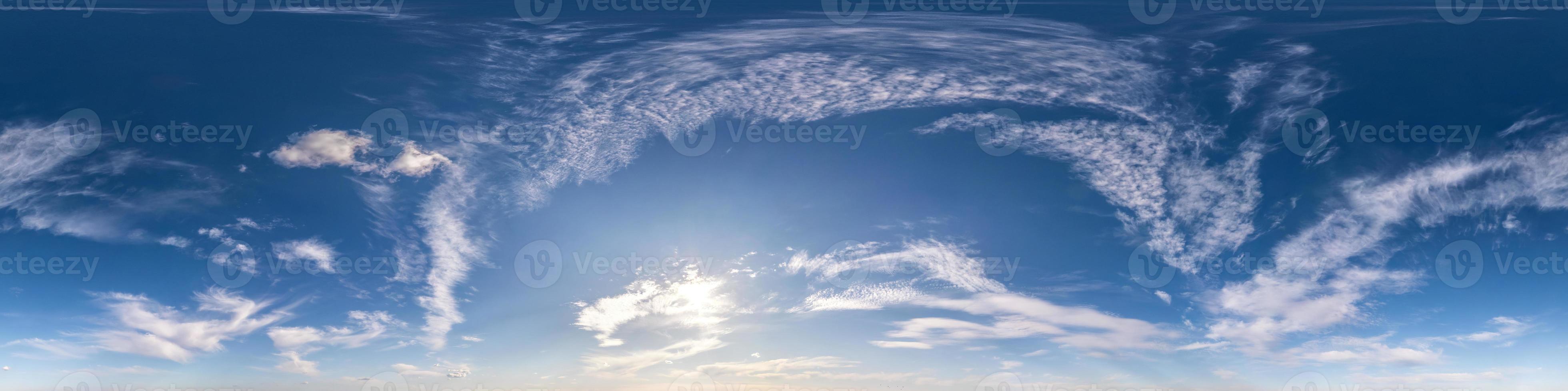 blue sky with beautiful fluffy cumulus clouds without ground. Seamless hdri panorama 360 degrees angle view without ground for use in 3d graphics or game development as sky dome or edit drone shot photo