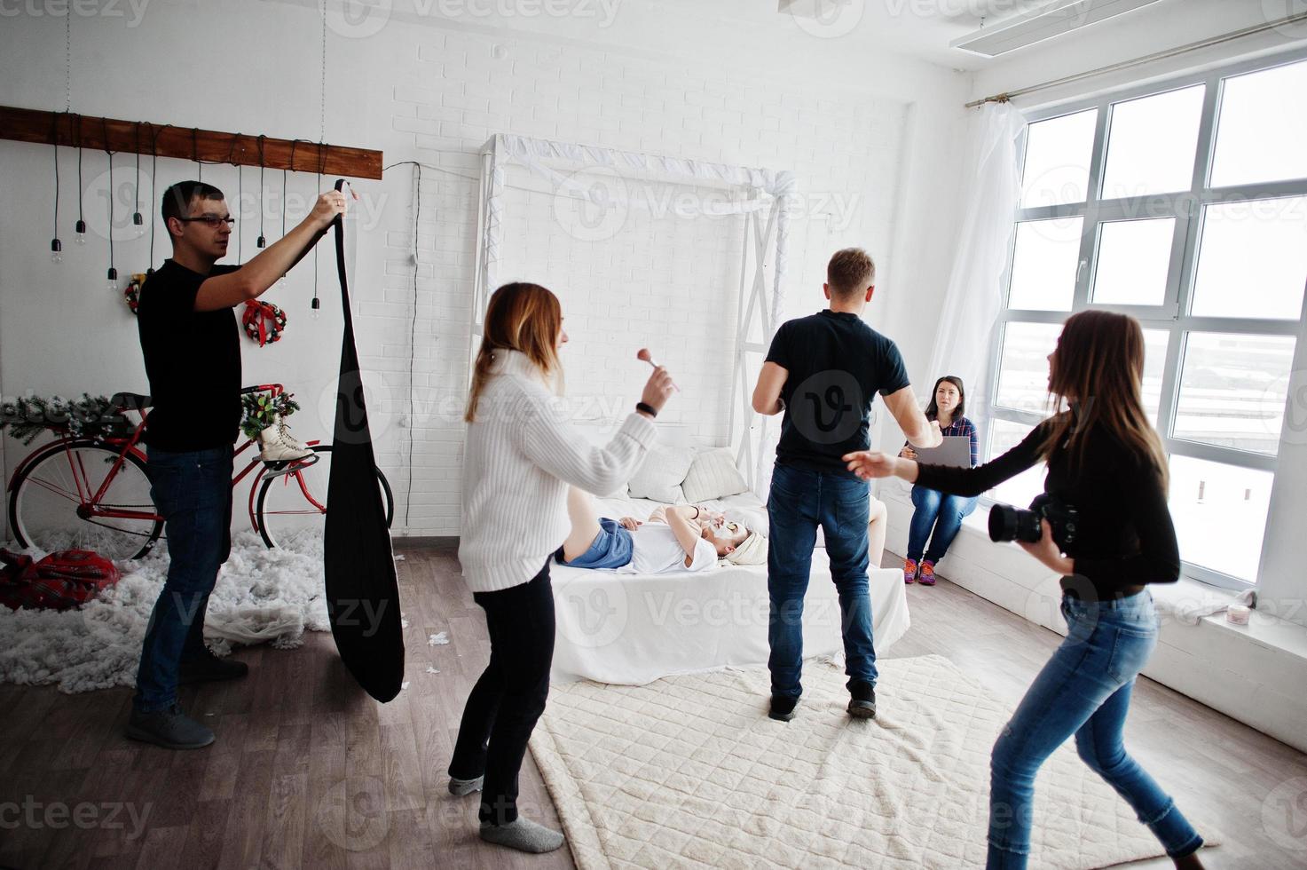 Work process of team photographer, designers and models stuff on photosession, master class of proffesionals. photo