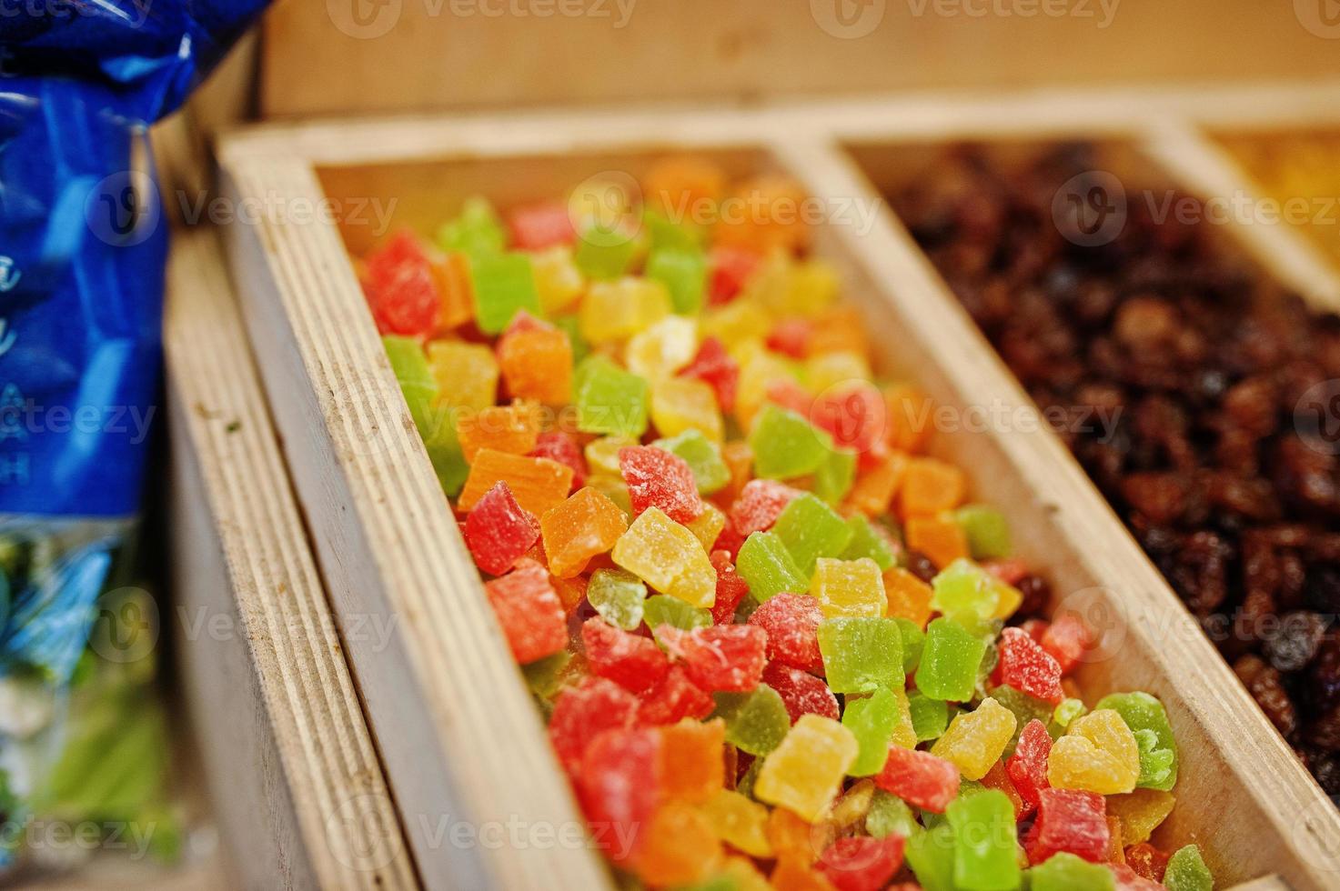 Raisins and candied fruits on the shelf of a supermarket or grocery