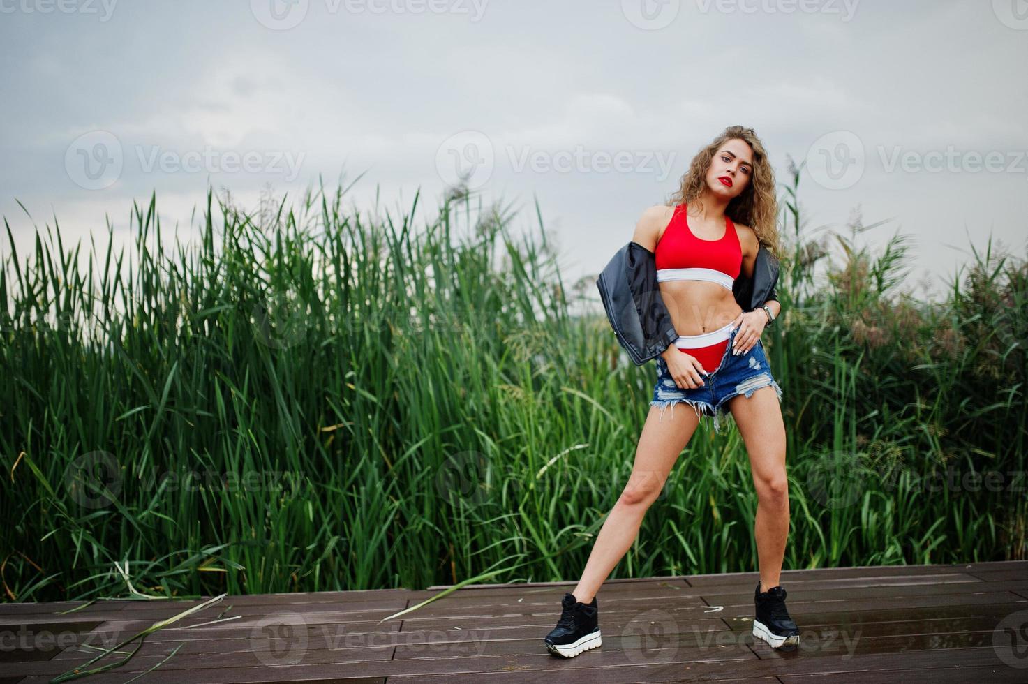 Sexy Girl Wearing Hot Pants And A Crop Top Stock Photo, Picture