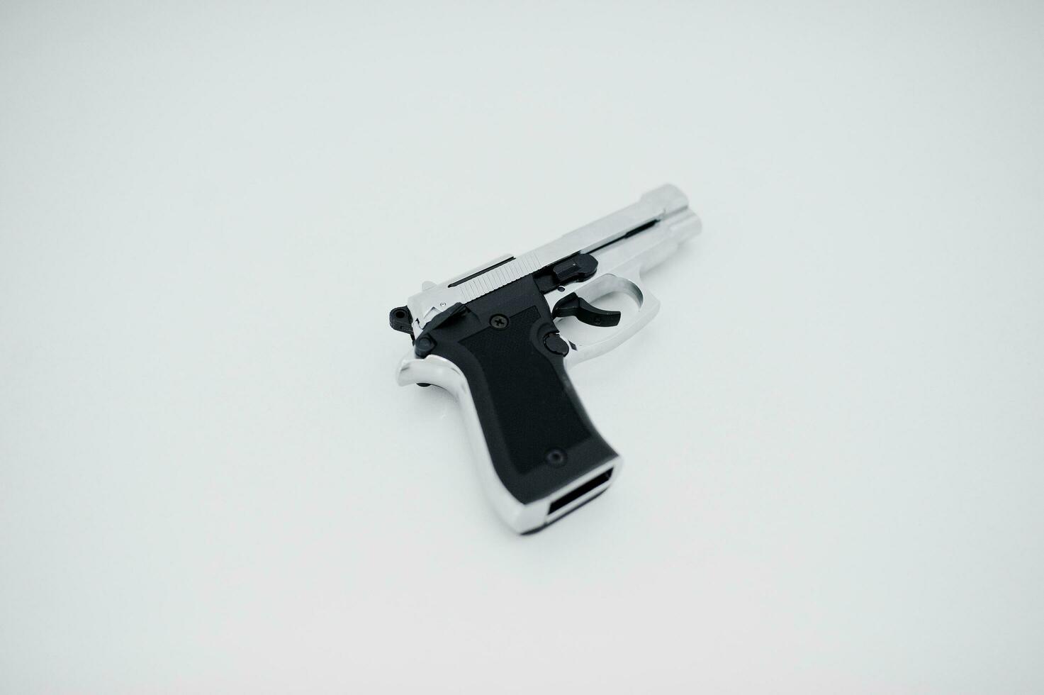 Gun weapon pistol  isolated on white. photo