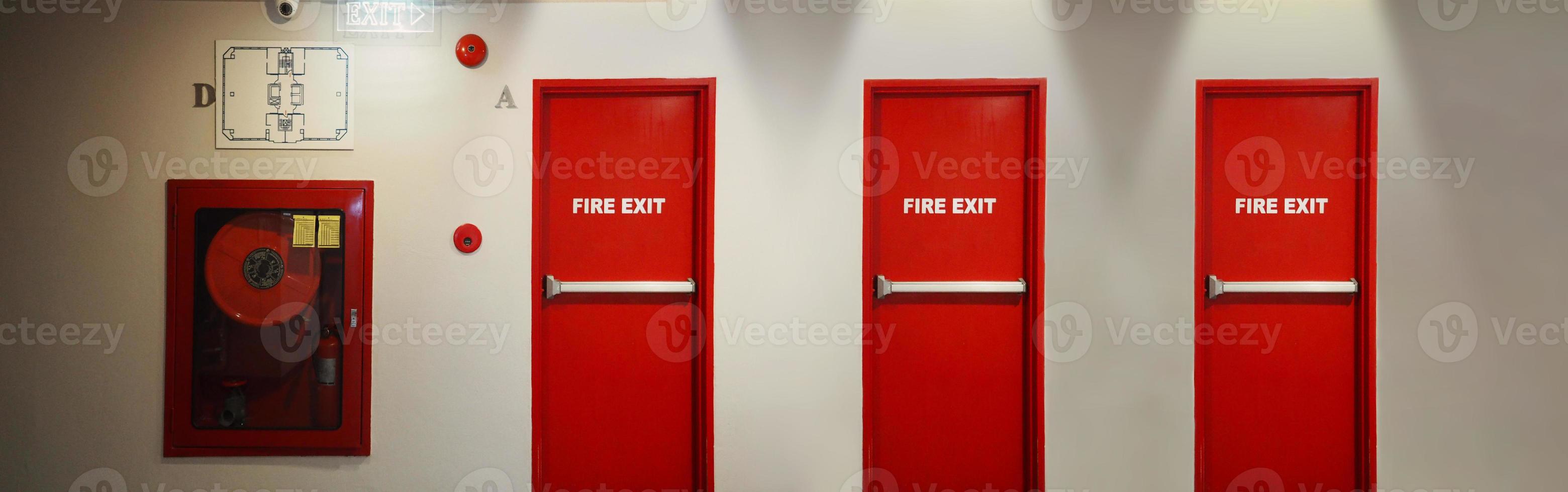 Fire exit door. Fire exit emergency door red color metal material photo