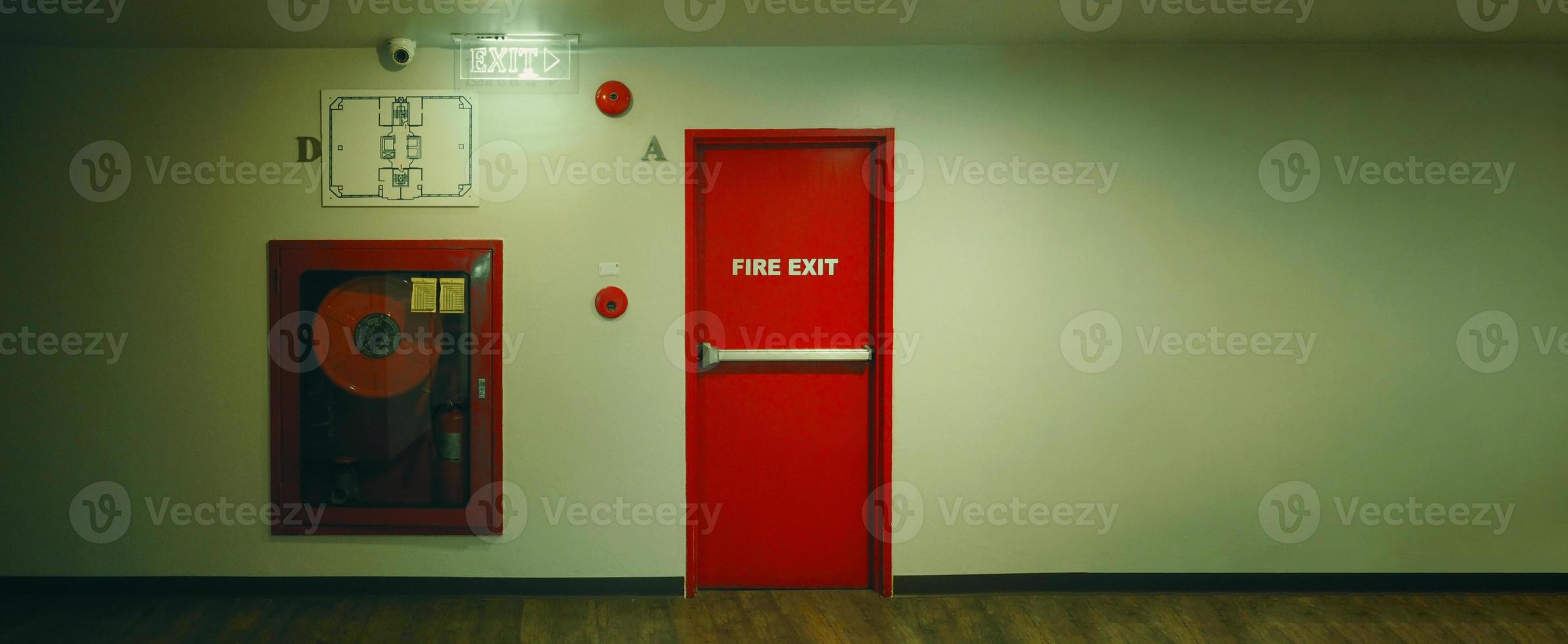 Fire exit door. Fire exit emergency door red color metal material photo