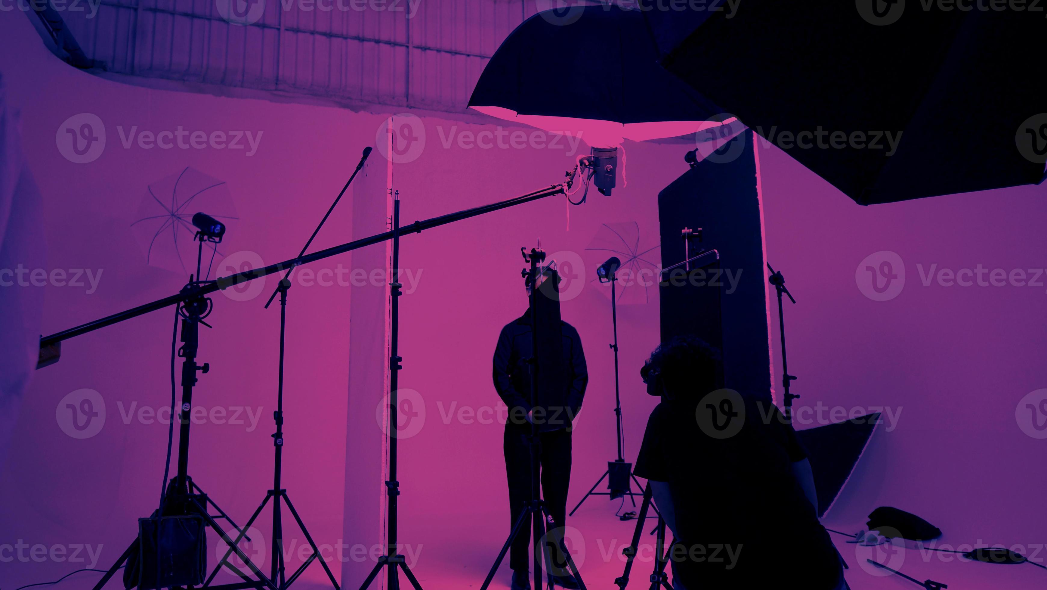 Studio video production lighting set. Behind the scenes shooting production set up 10341900