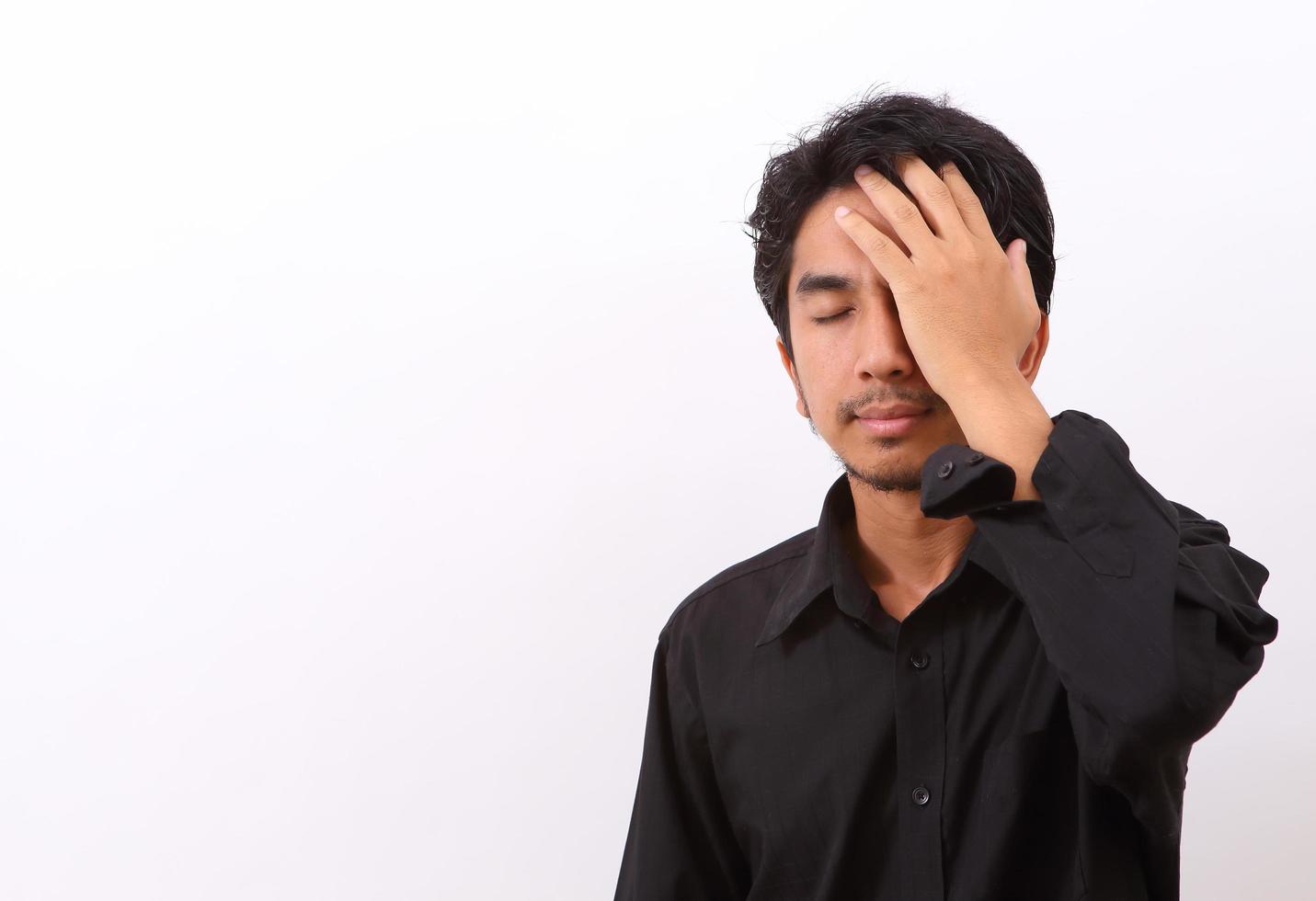 Portrait of young sad man worrying photo