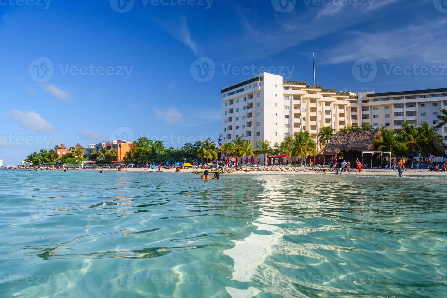 Ripple in the water near hotel on the sandy beach in Cancun, Yukatan, Mexico photo