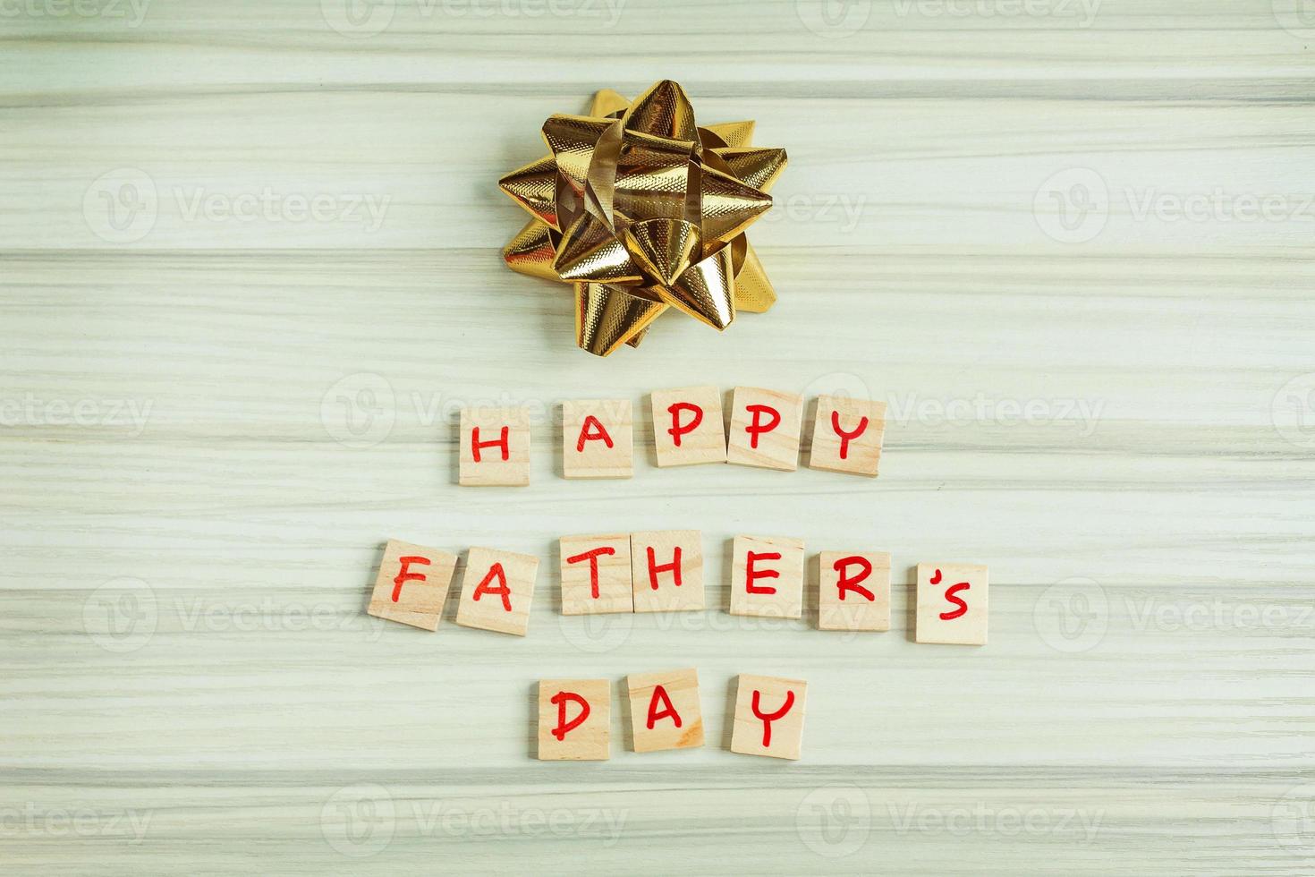 alphabet on small plate on wood table for Father  day image. photo