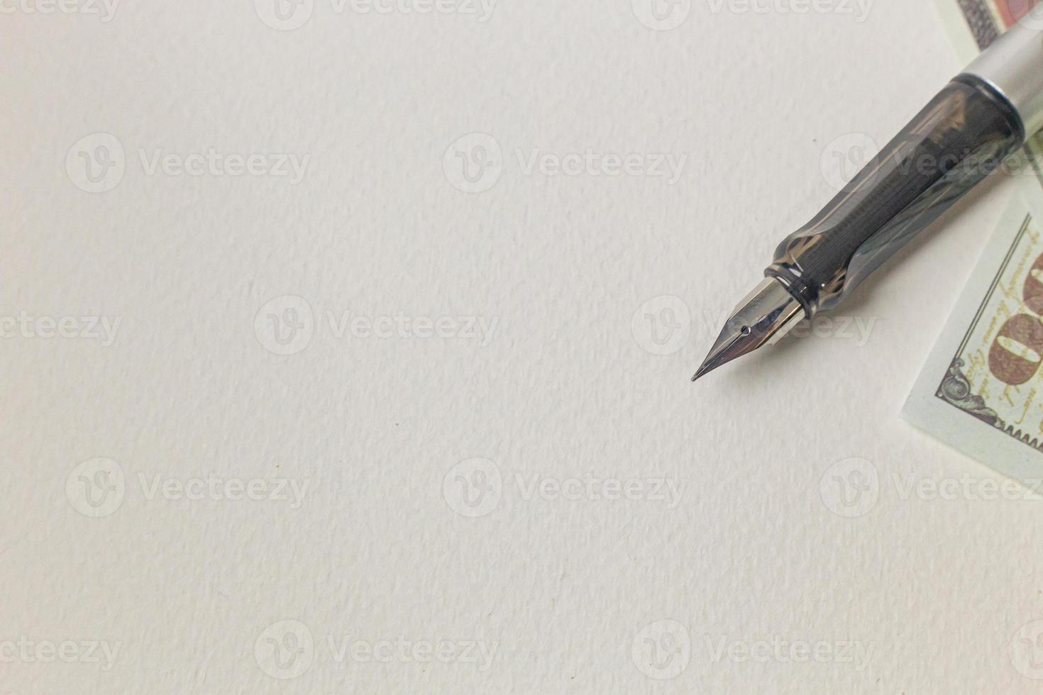 pen and banknotes image for business concept. photo