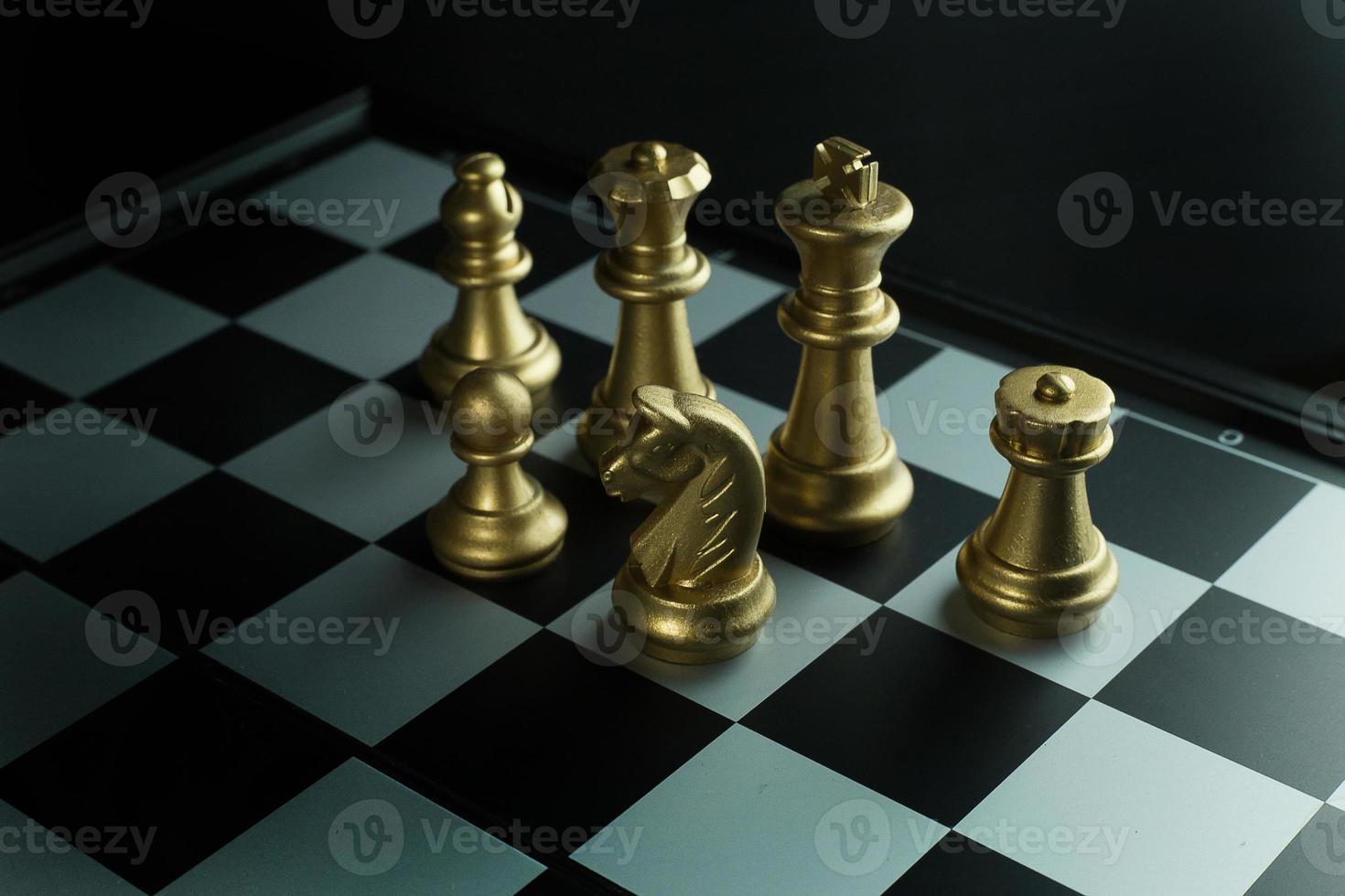 gold and silver chess on board close up image abstract Background. photo