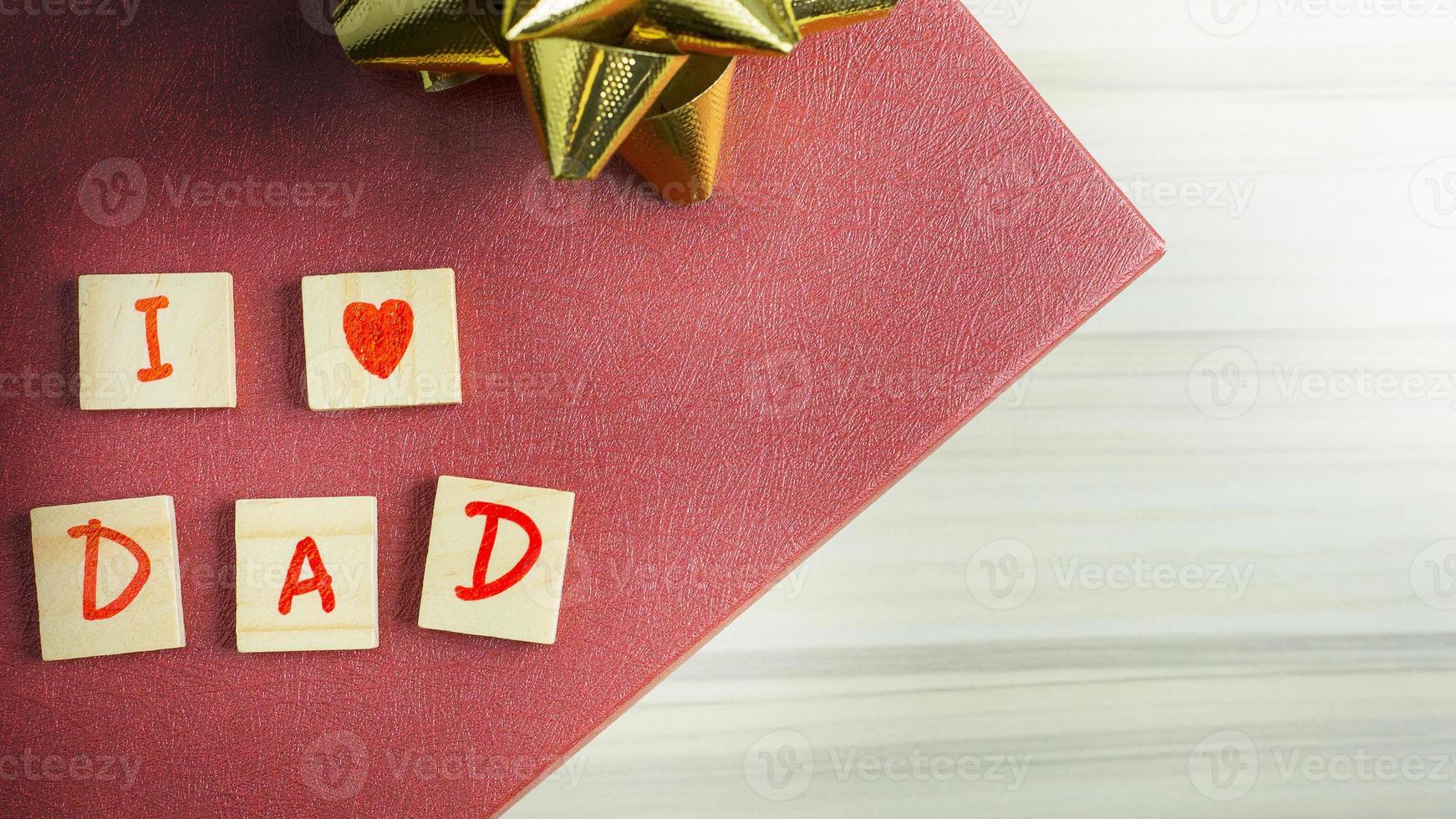 alphabet on small plate on wood table for Father  day image. photo