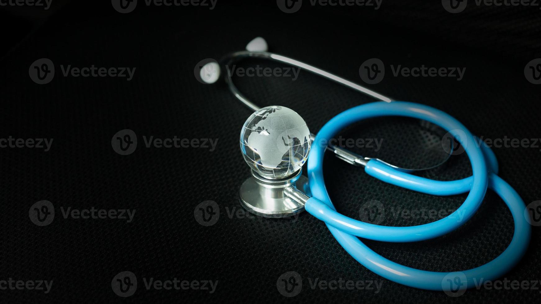 stethoscopes on black background image close up photo