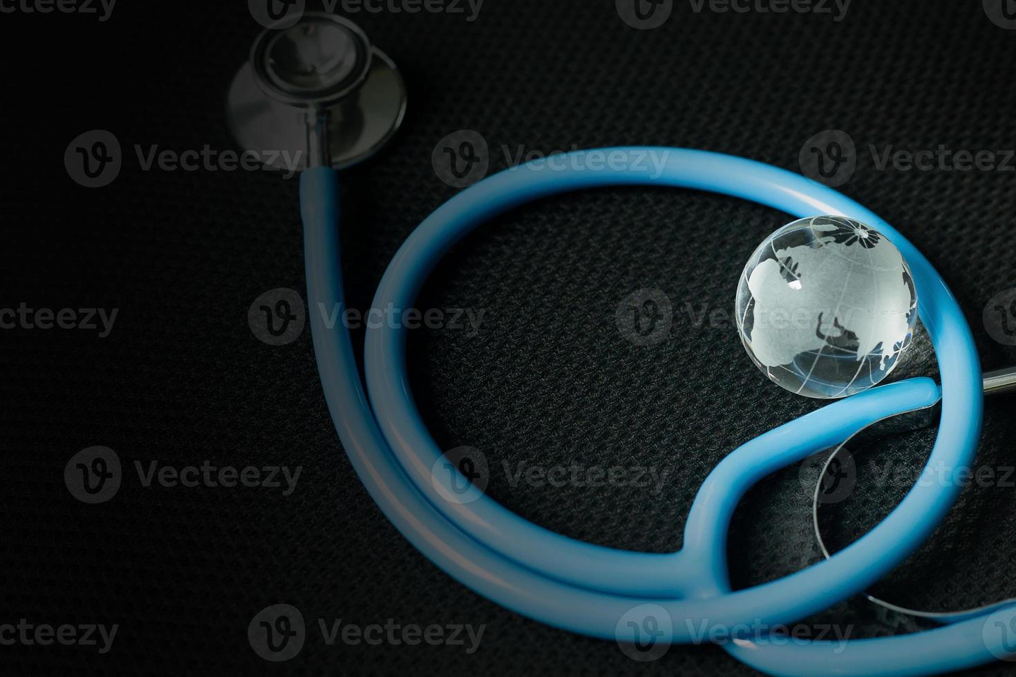 stethoscopes on black background image close up photo