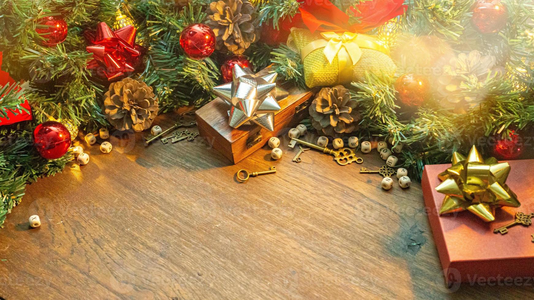 Christmas decorations on wood table for holiday content. photo