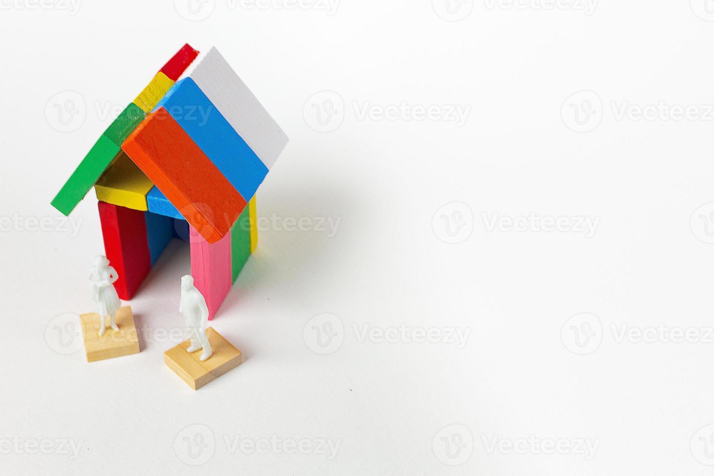 The domino multi color build home on white background. photo