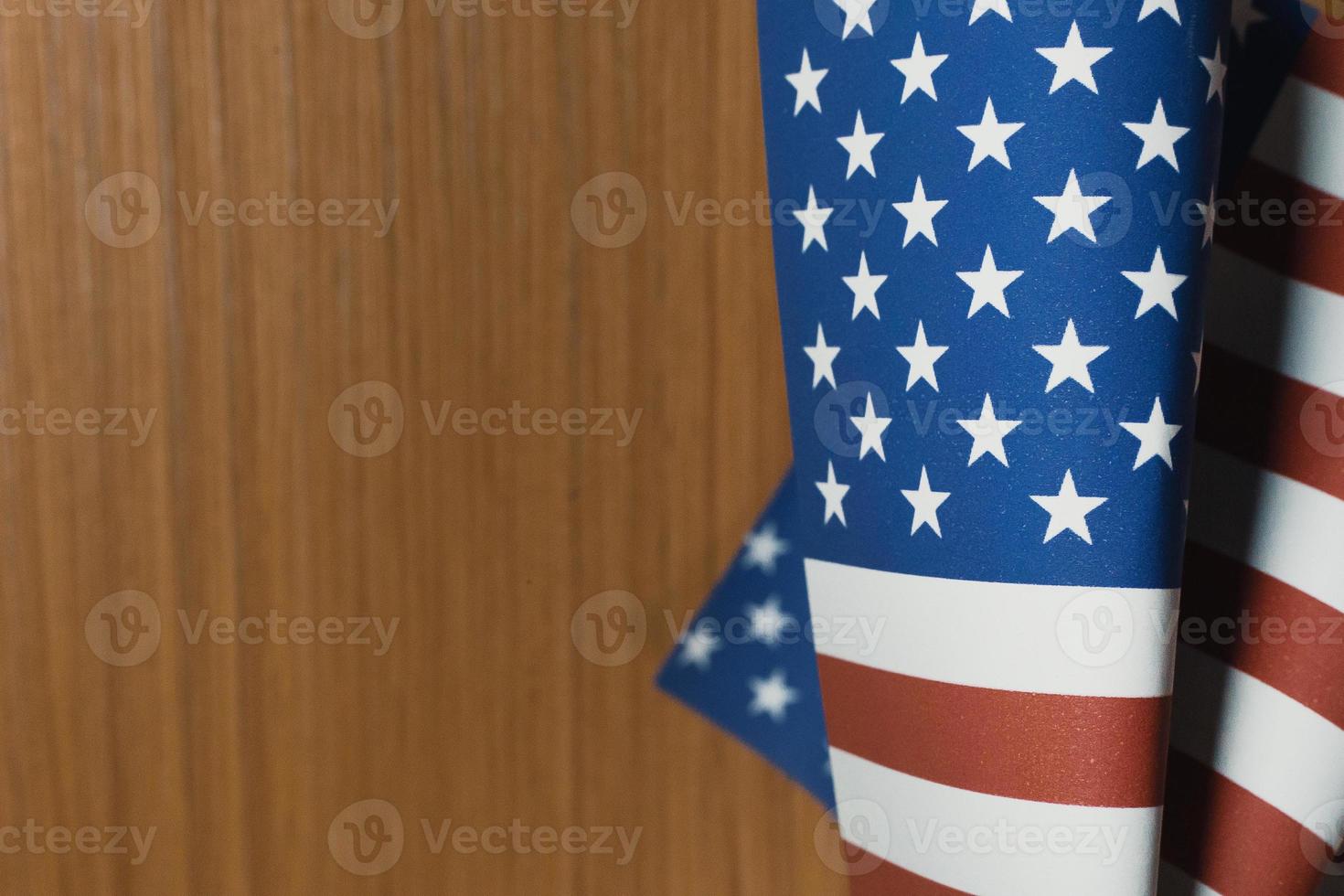 The Veterans Day  concept united states of America flag on wood background. photo