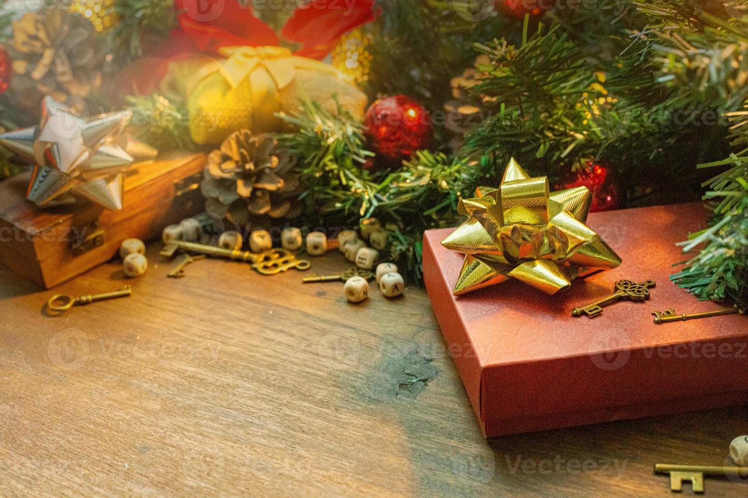 Christmas decorations on wood table for holiday content. photo