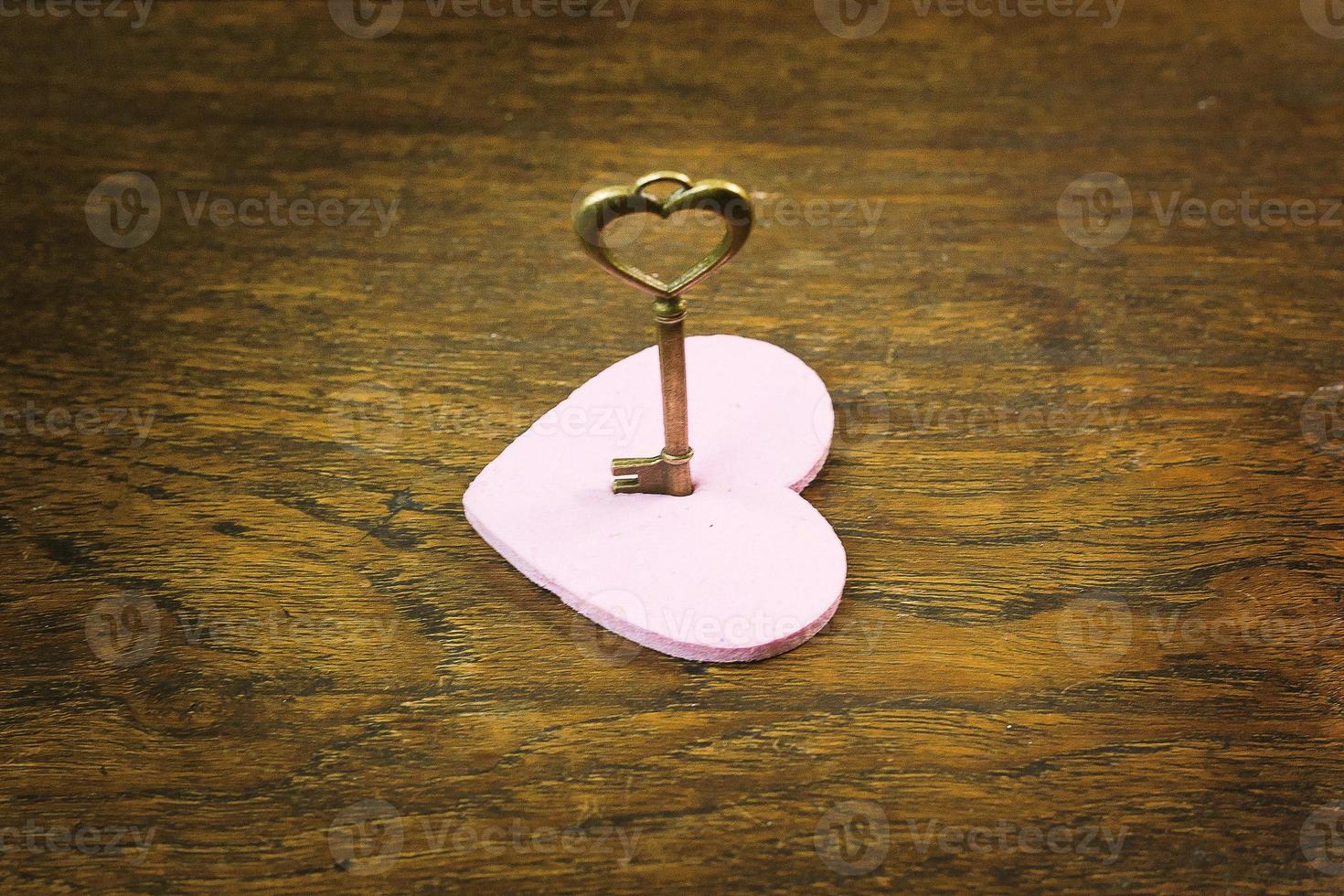 vintage gold  key heart  abstract close up image. photo