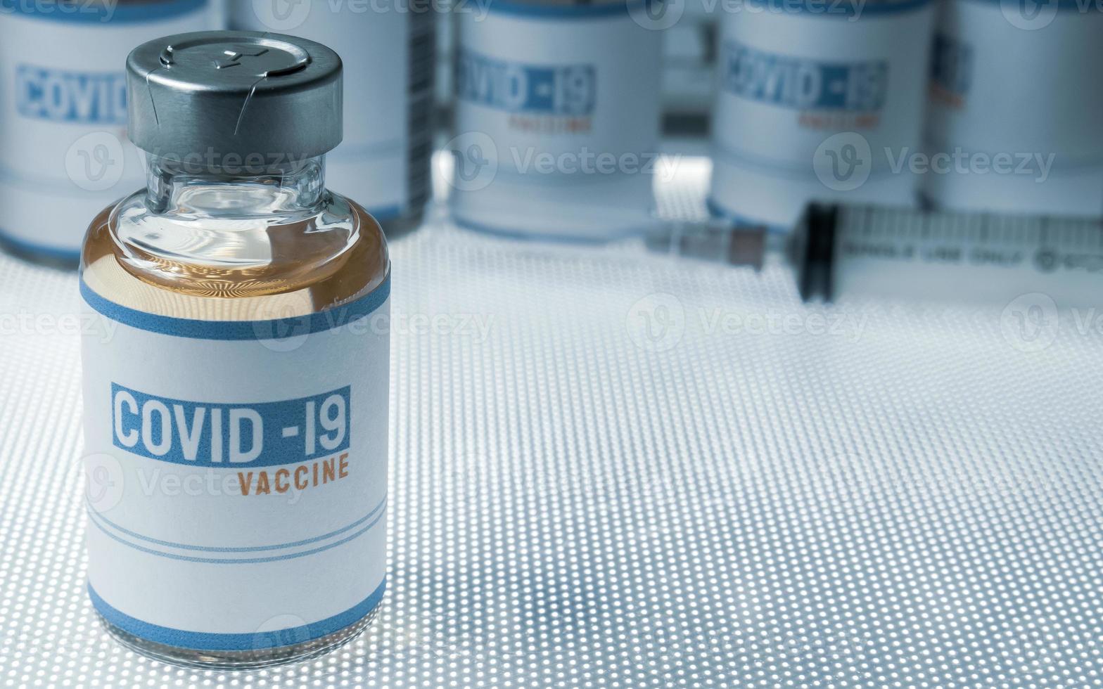 vaccine covid 19 in bottle for medical content. photo