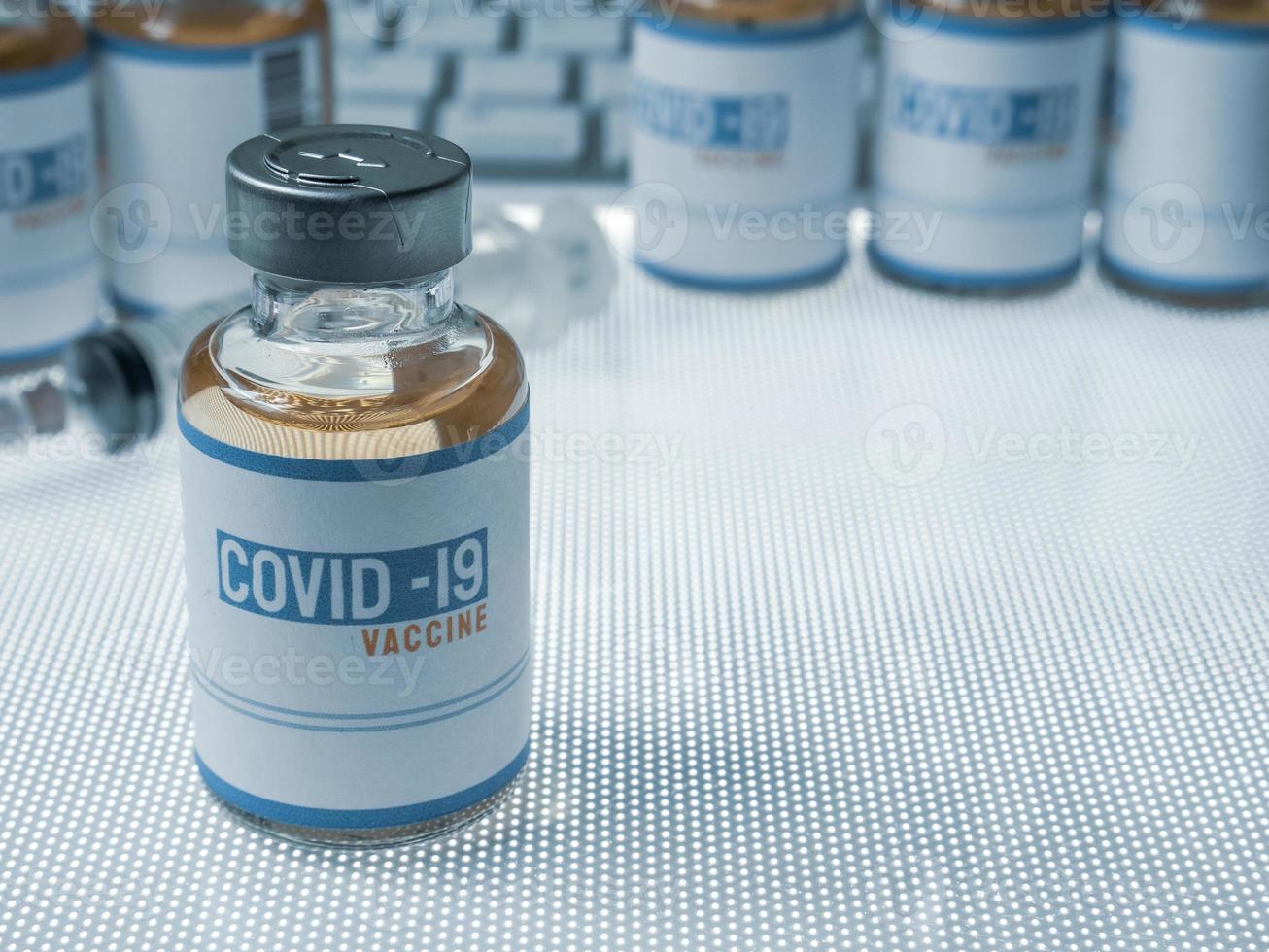 vaccine covid 19 in bottle for medical content. photo