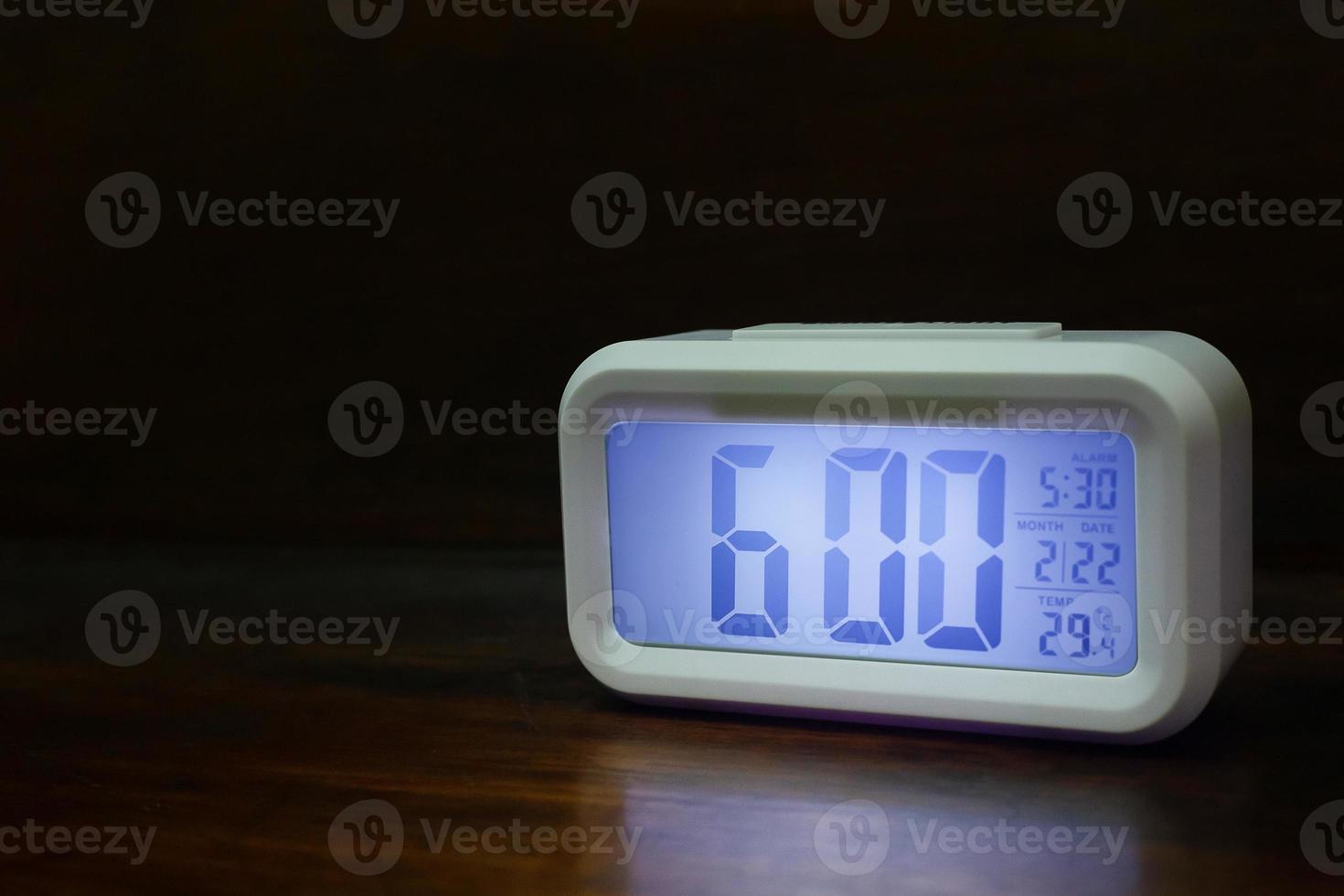 Digital alarm clock  6am close up image. photo