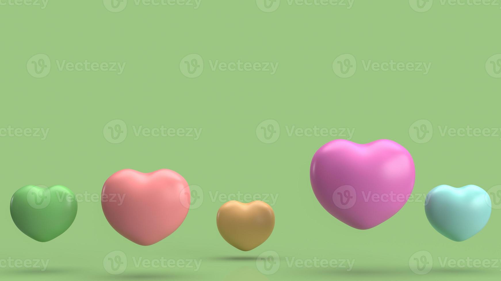 The  heart multi colour   on green background for abstract content 3d rendering photo