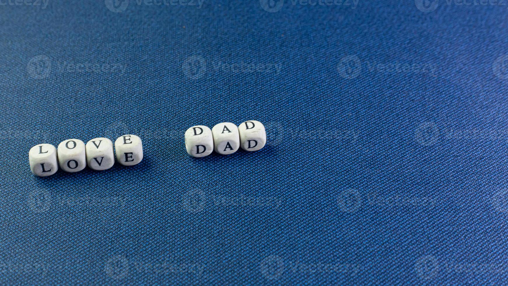 wooden text  for father day content close up image. photo