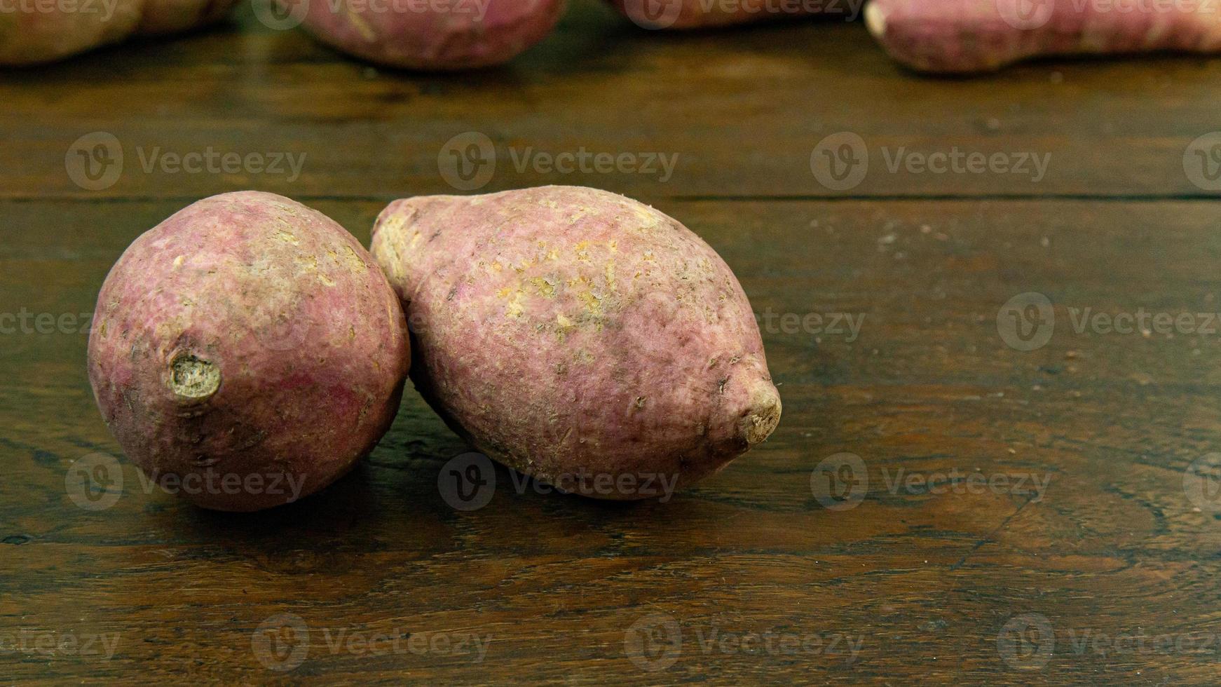 cassava on wood table for food concept. photo