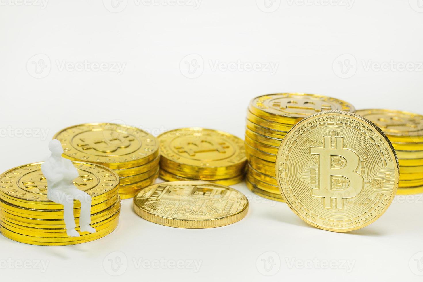 white miniature and gold coin bitcoin abstract image close up background. photo
