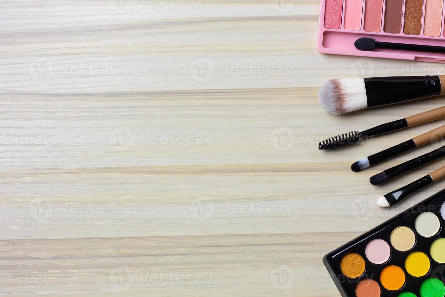 The cosmetic flat lay on wood background. photo