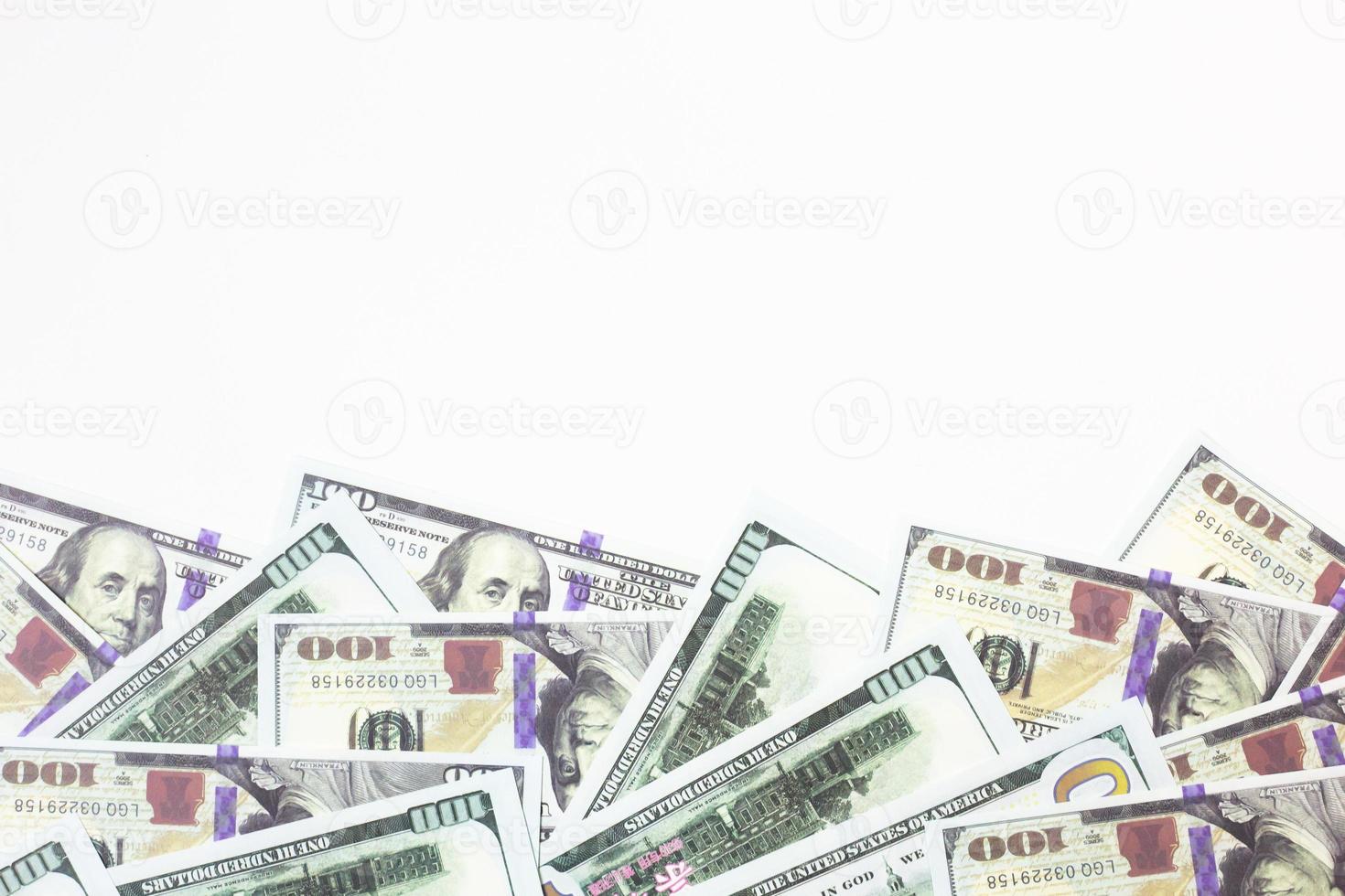 The  Close up 100 dollar banknote on white background for  business content. photo