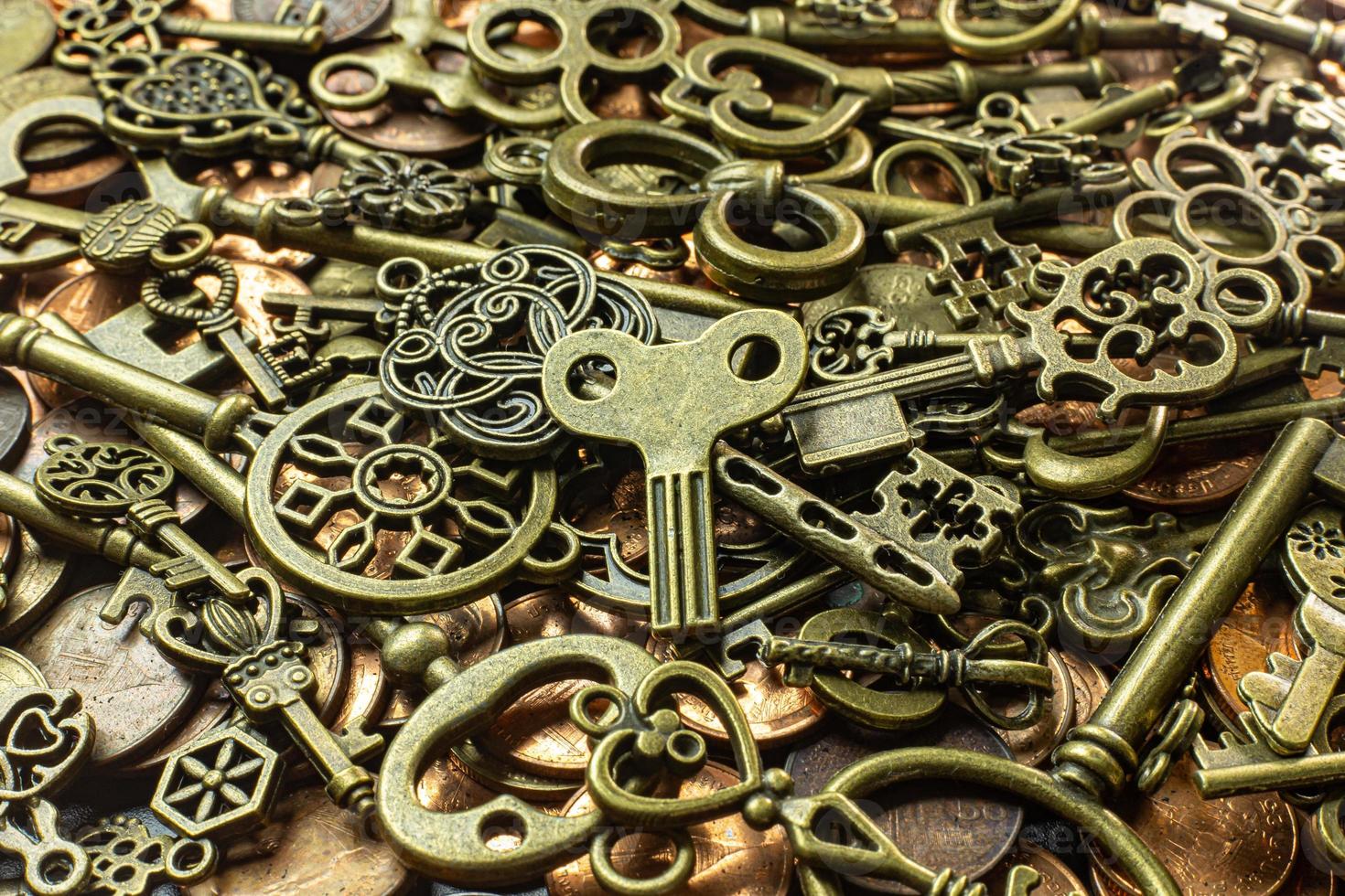 Old vintage keys gold texture on copper coin  abstract background. photo