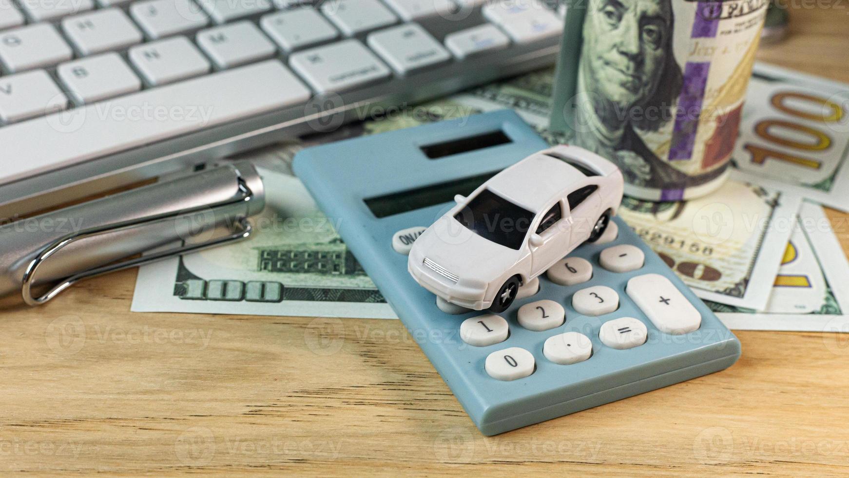 white  toy car  on work station table in office. photo