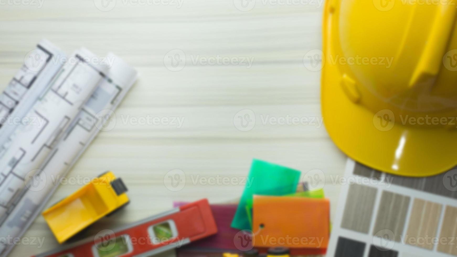 wood table and construction plan photo