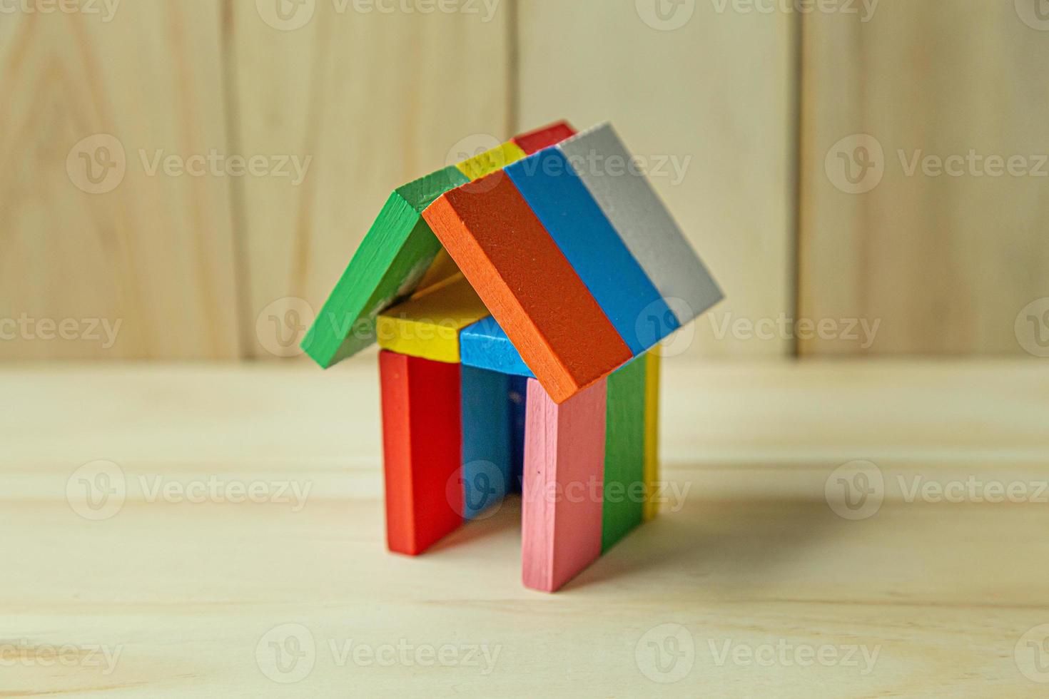 home toy on wood for property content. photo