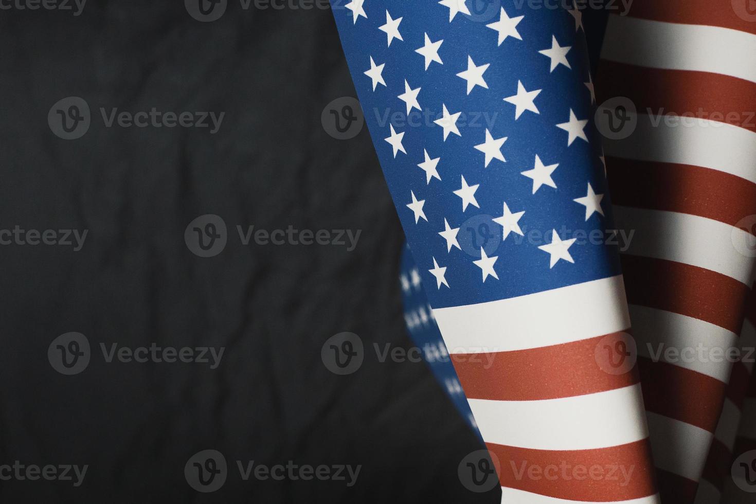 The Veterans Day  concept united states of America flag on black background. photo