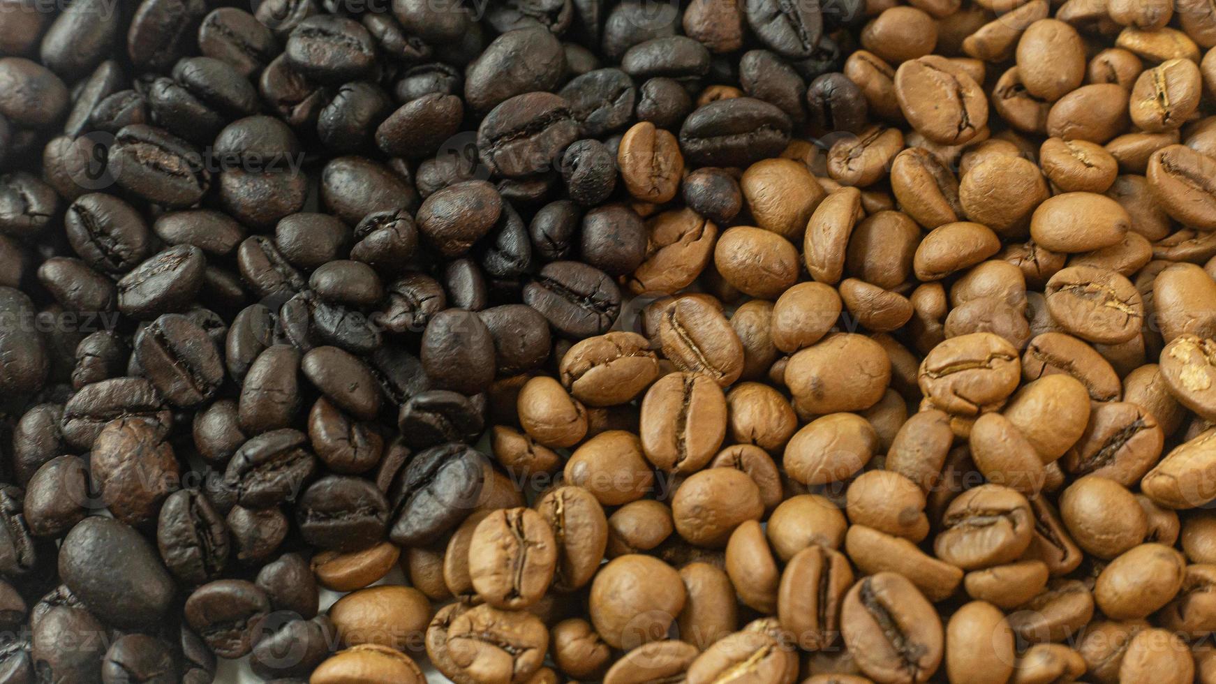 coffee beans dry process and dark   close up image. photo