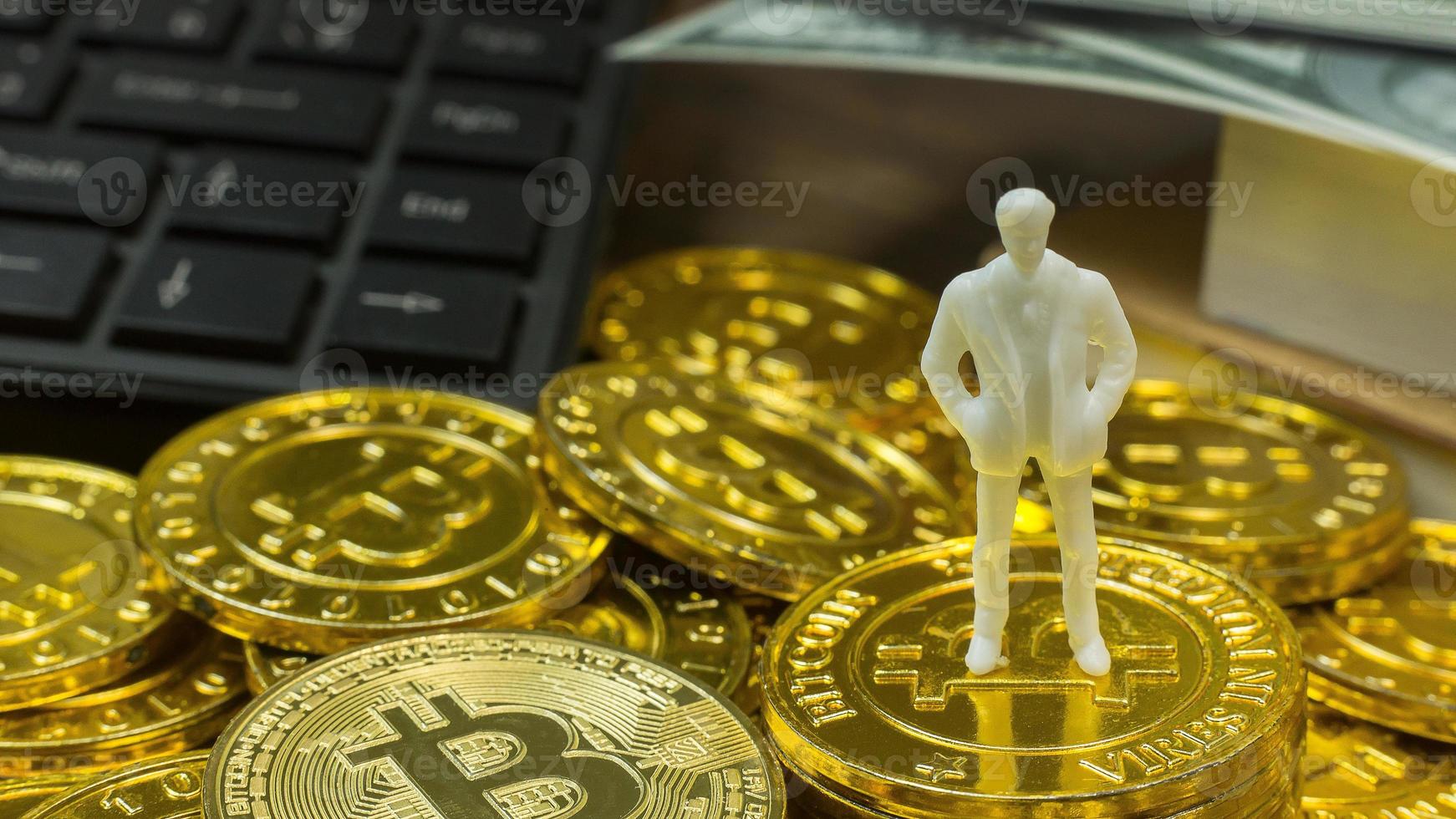 white miniature and gold coin bitcoin abstract image close up background. photo