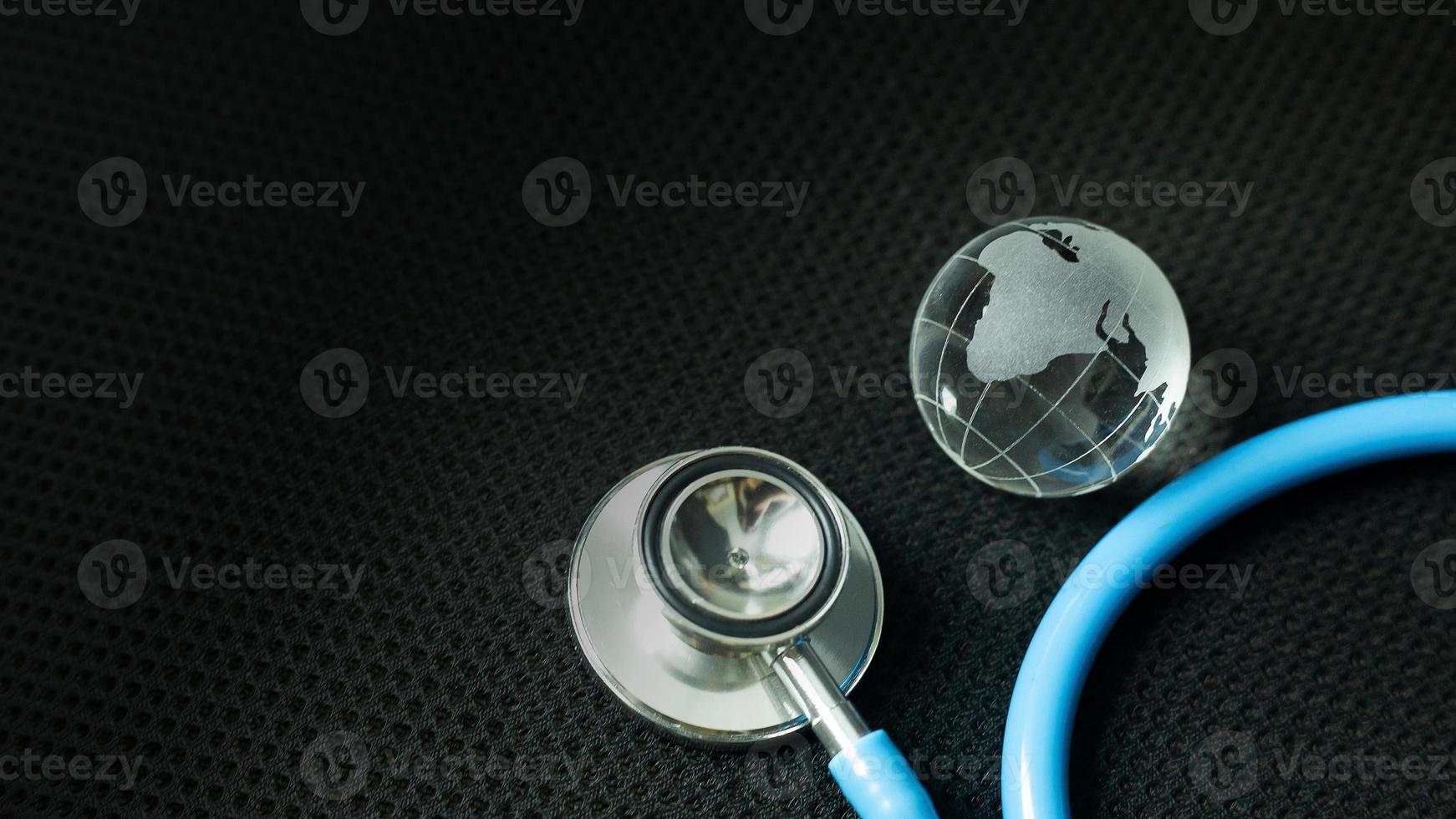 stethoscopes on black background image close up photo