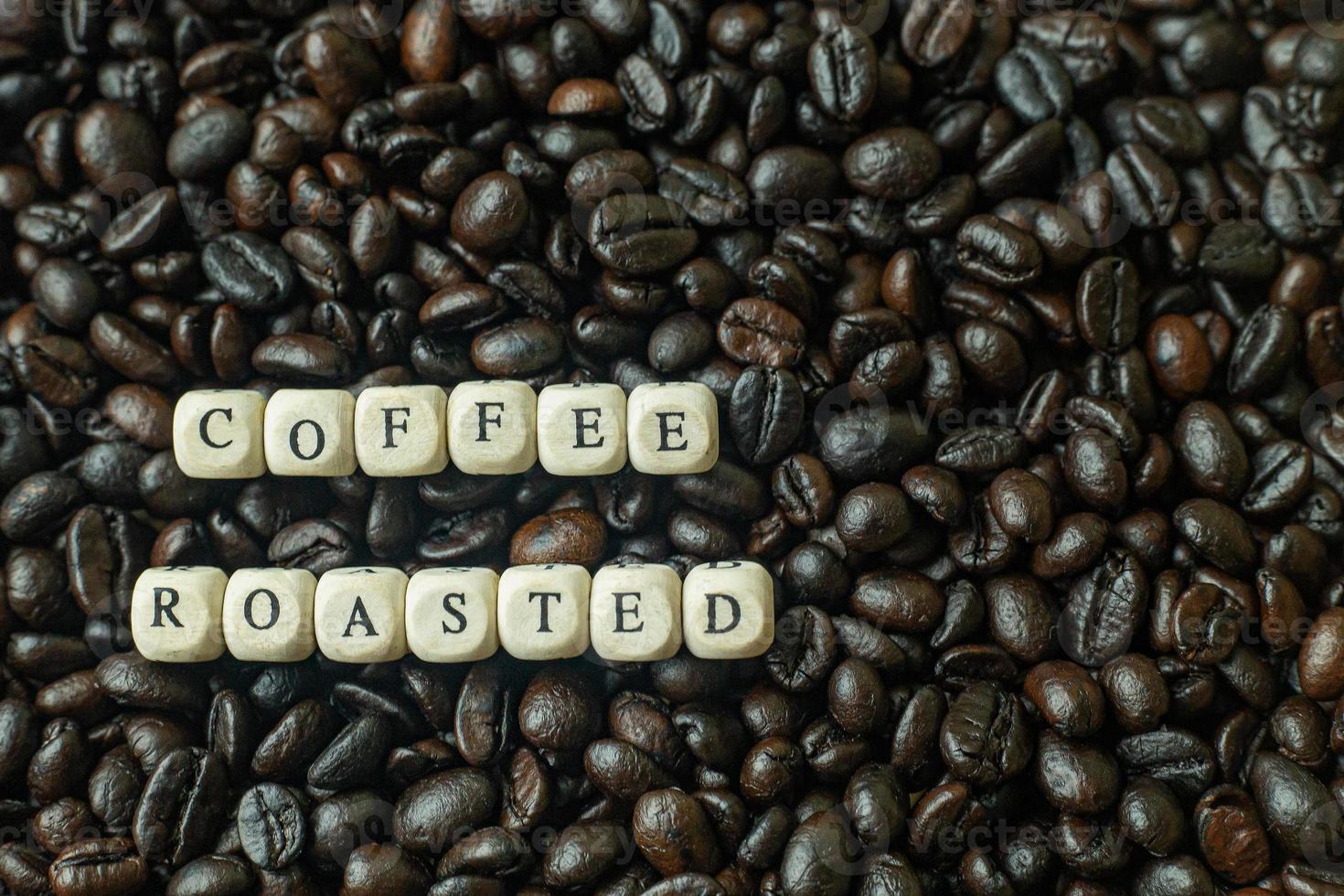 coffee roasted and text wood cube close up image. photo