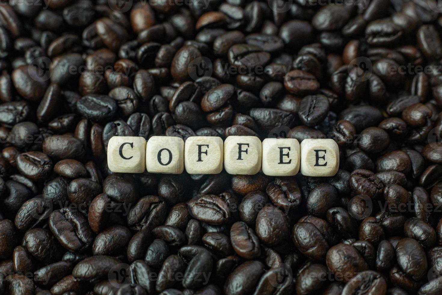 coffee roasted and text wood cube close up image. photo