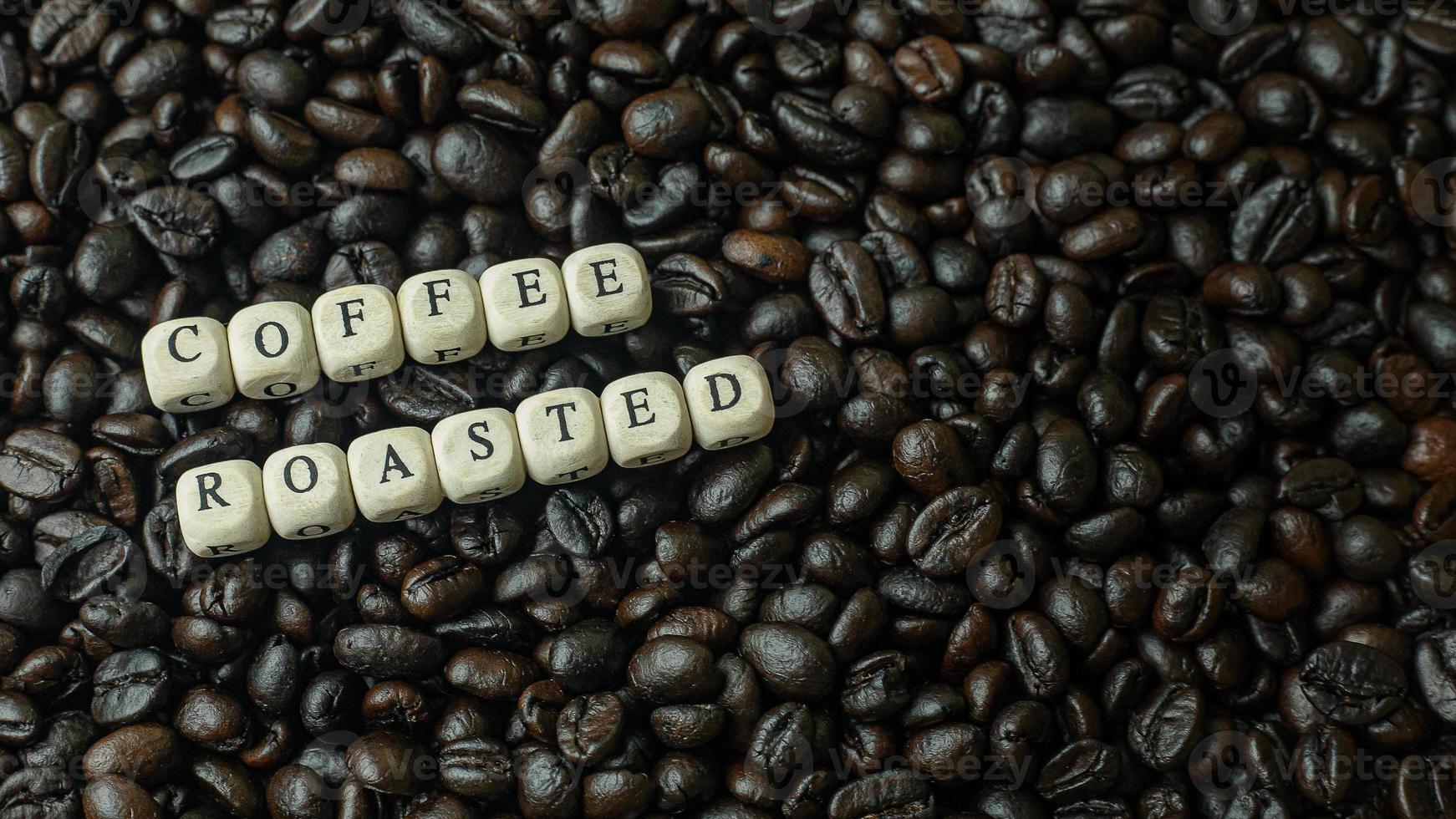 coffee roasted and text wood cube close up image. photo