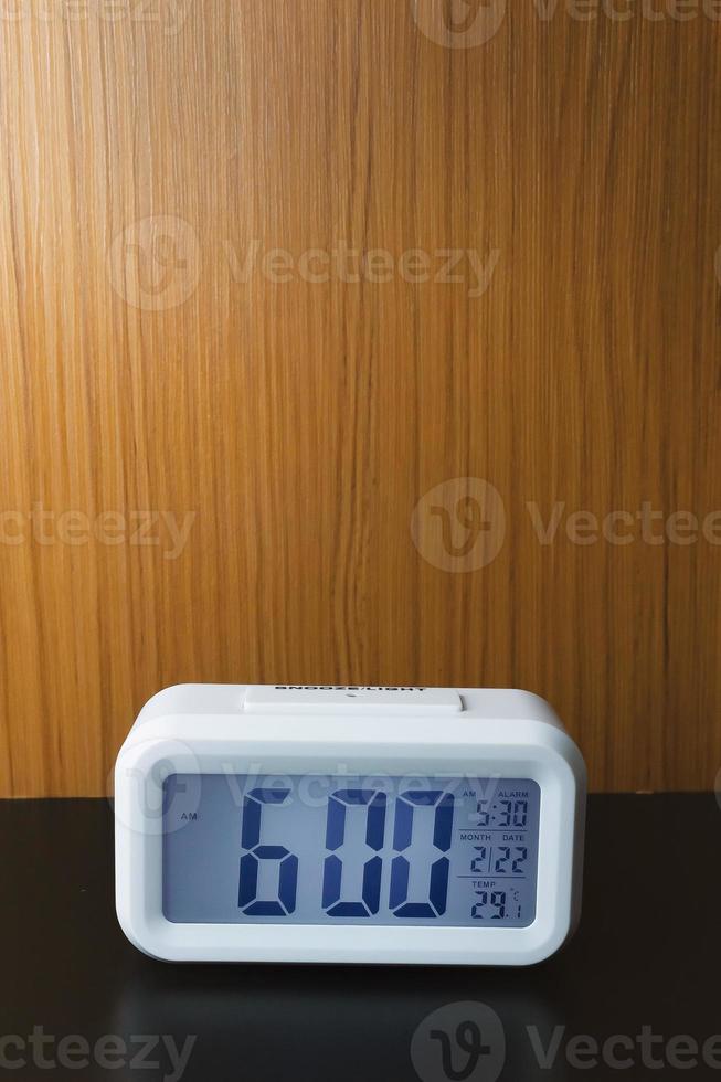Digital alarm clock  6am close up image. photo